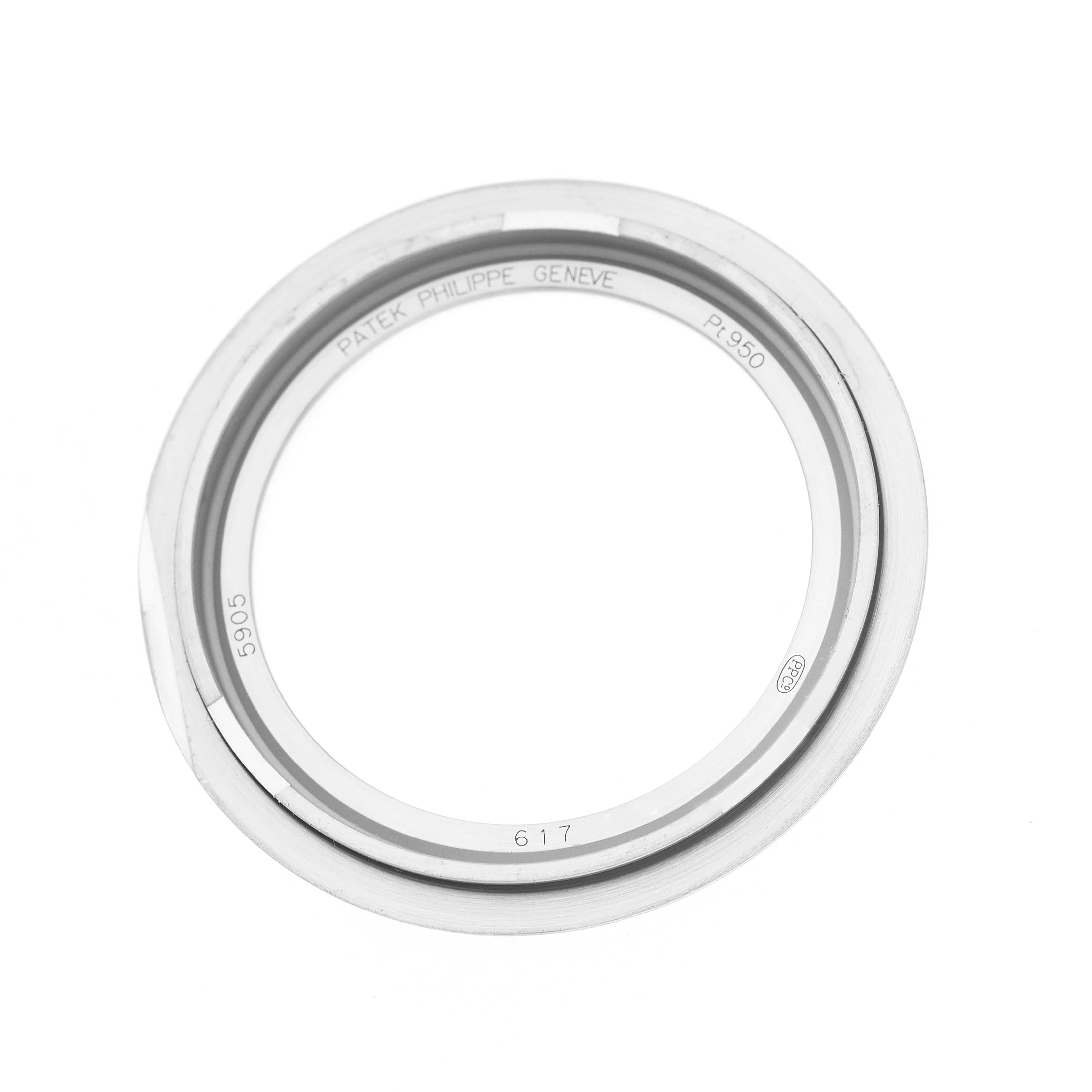 The image shows a bezel from a Patek Philippe Complications 5905 Men's Platinum Black Dial model, viewed from above.