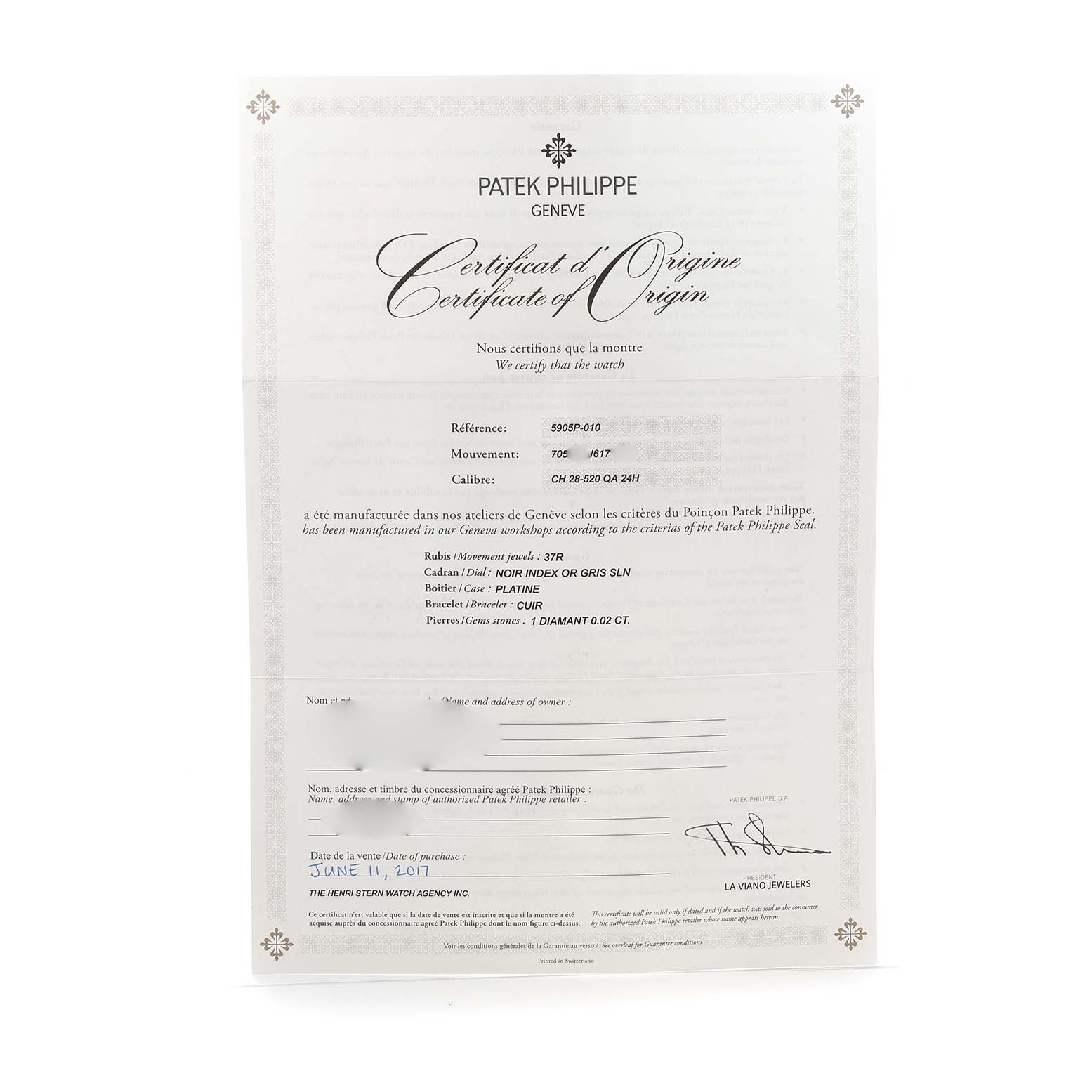 This image shows a Patek Philippe Complications 5905 Men's Platinum Black Dial model's Certificate of Origin document, viewed from a top angle.
