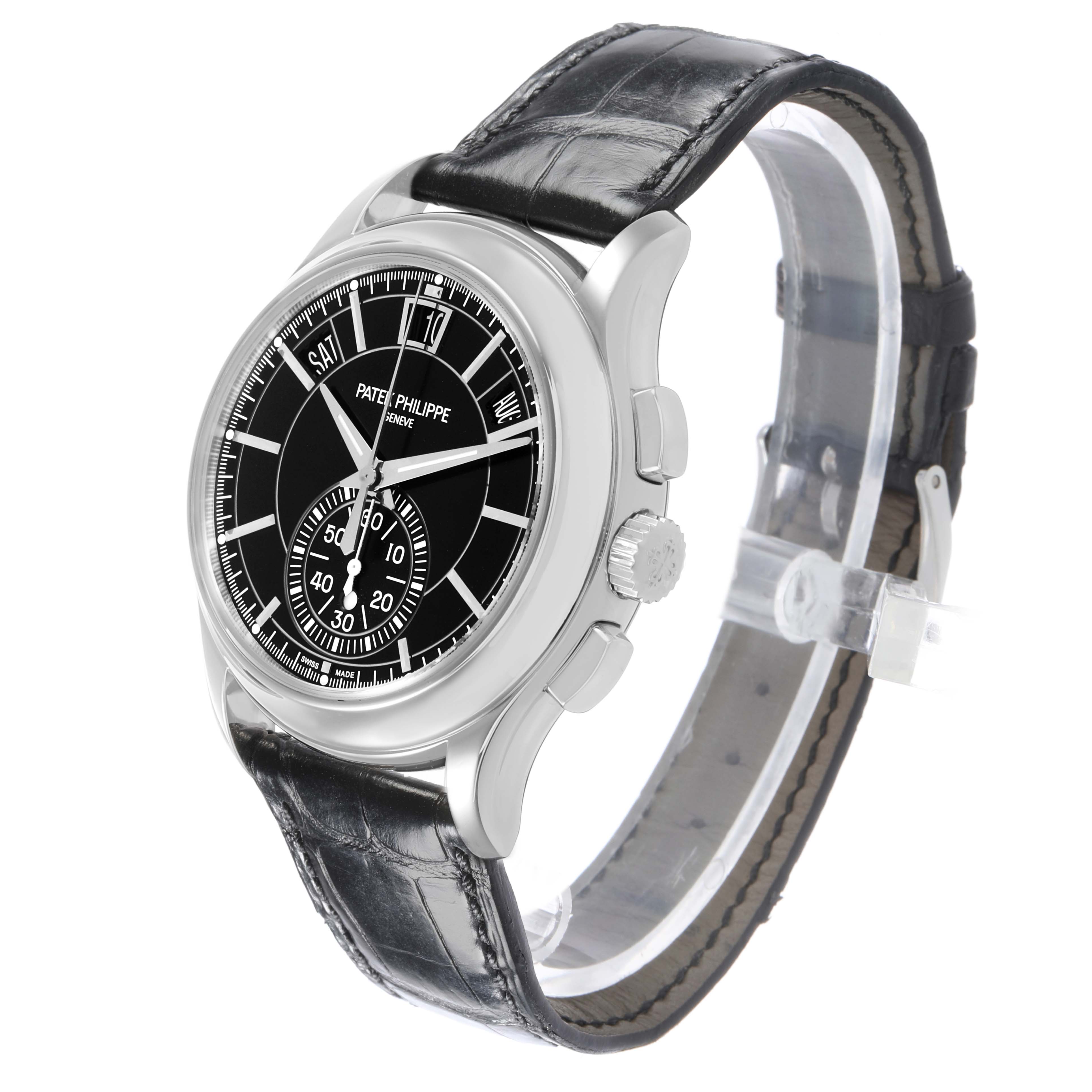 The Patek Philippe Complications 5905 Men's Platinum Black Dial watch is shown at a slight angle, displaying the face, crown, pushers, and leather strap.