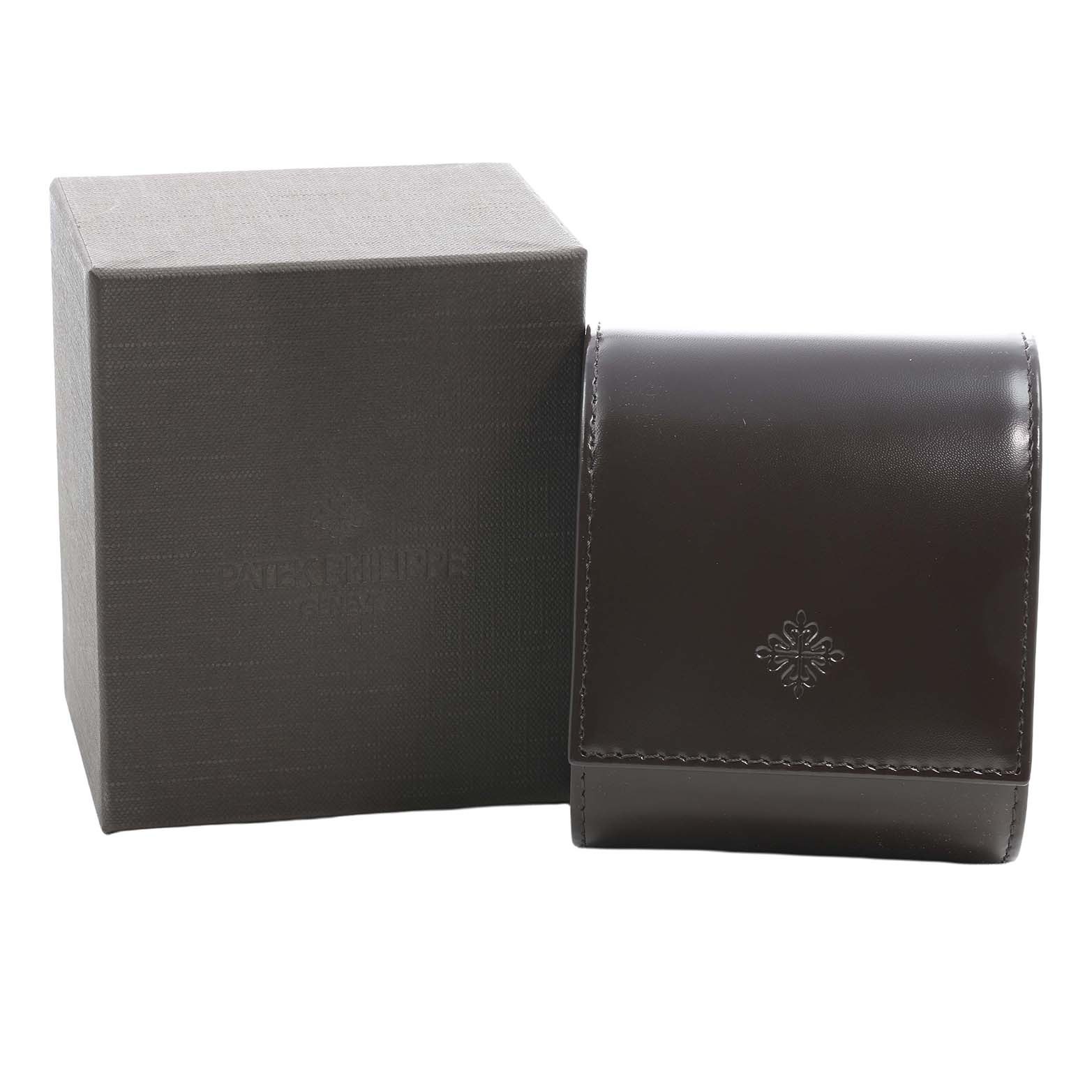 The image shows the packaging for a Patek Philippe Twenty-4 4920R Women's Rose Gold Brown Dial watch, including a dark leather case and a matching box.