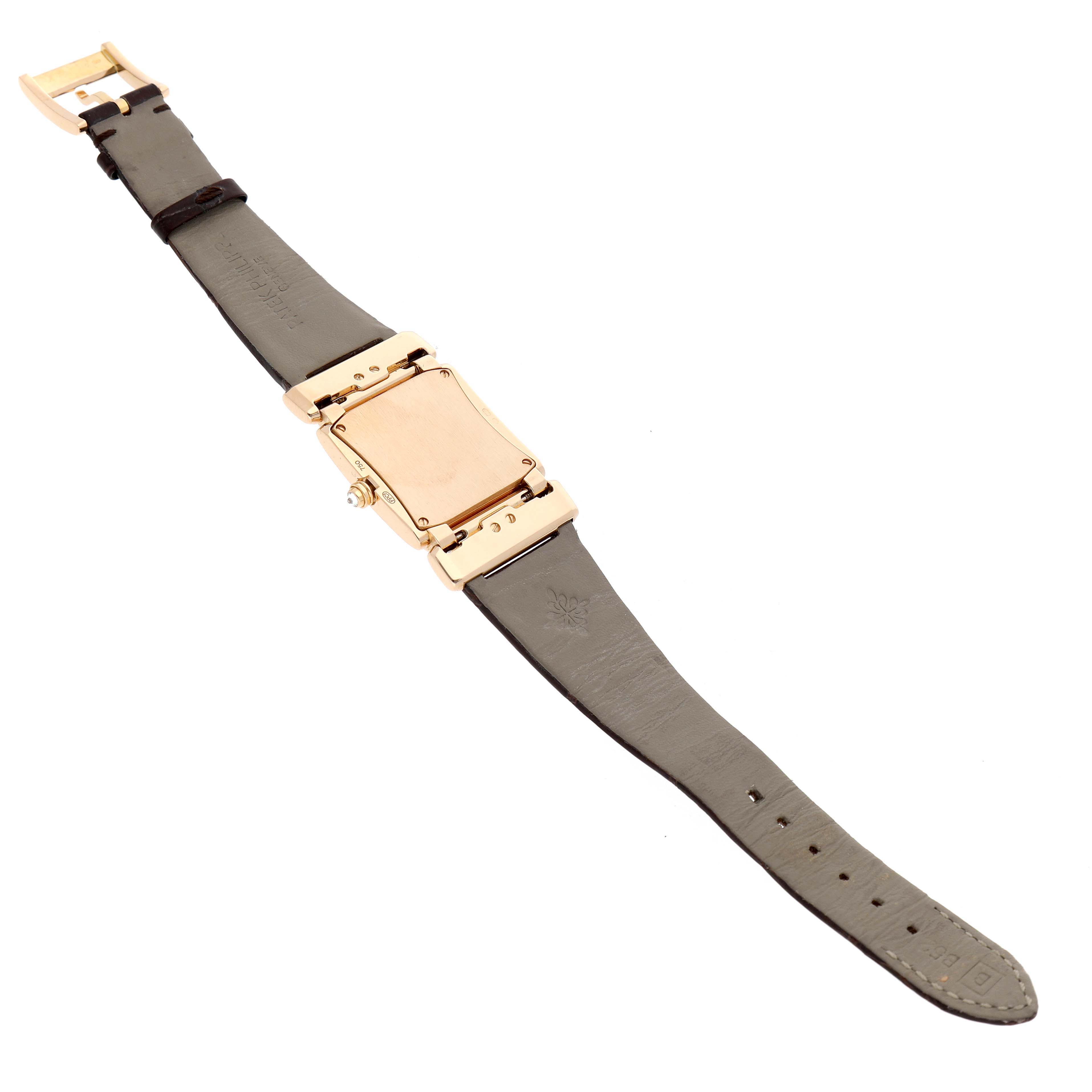 The image shows the back view of a Patek Philippe Twenty-4 4920R Women's Rose Gold Brown Dial watch, highlighting the case back and leather strap.