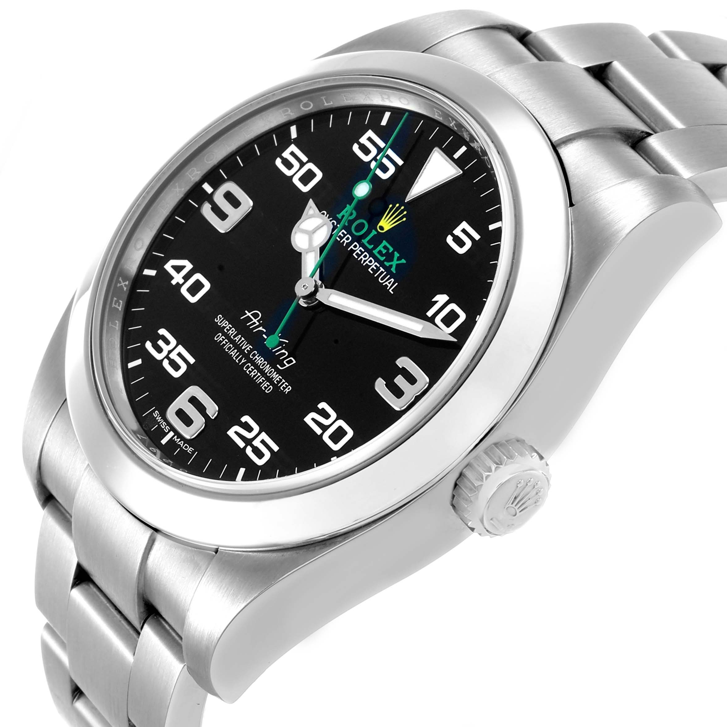 The image shows a Rolex Air-King 116900 Men's Stainless Steel Black Dial watch at an angled view, highlighting the black dial, numeric markers, stainless steel bezel, and bracelet.