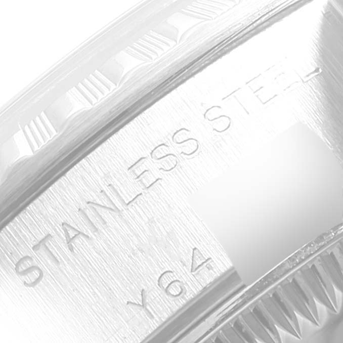 The image shows a close-up of the case side with "Stainless Steel" engraving on a Rolex Date 79240 Women's Stainless Steel Blue Dial 79240 Women's Stainless Steel Blue Dial model watch.