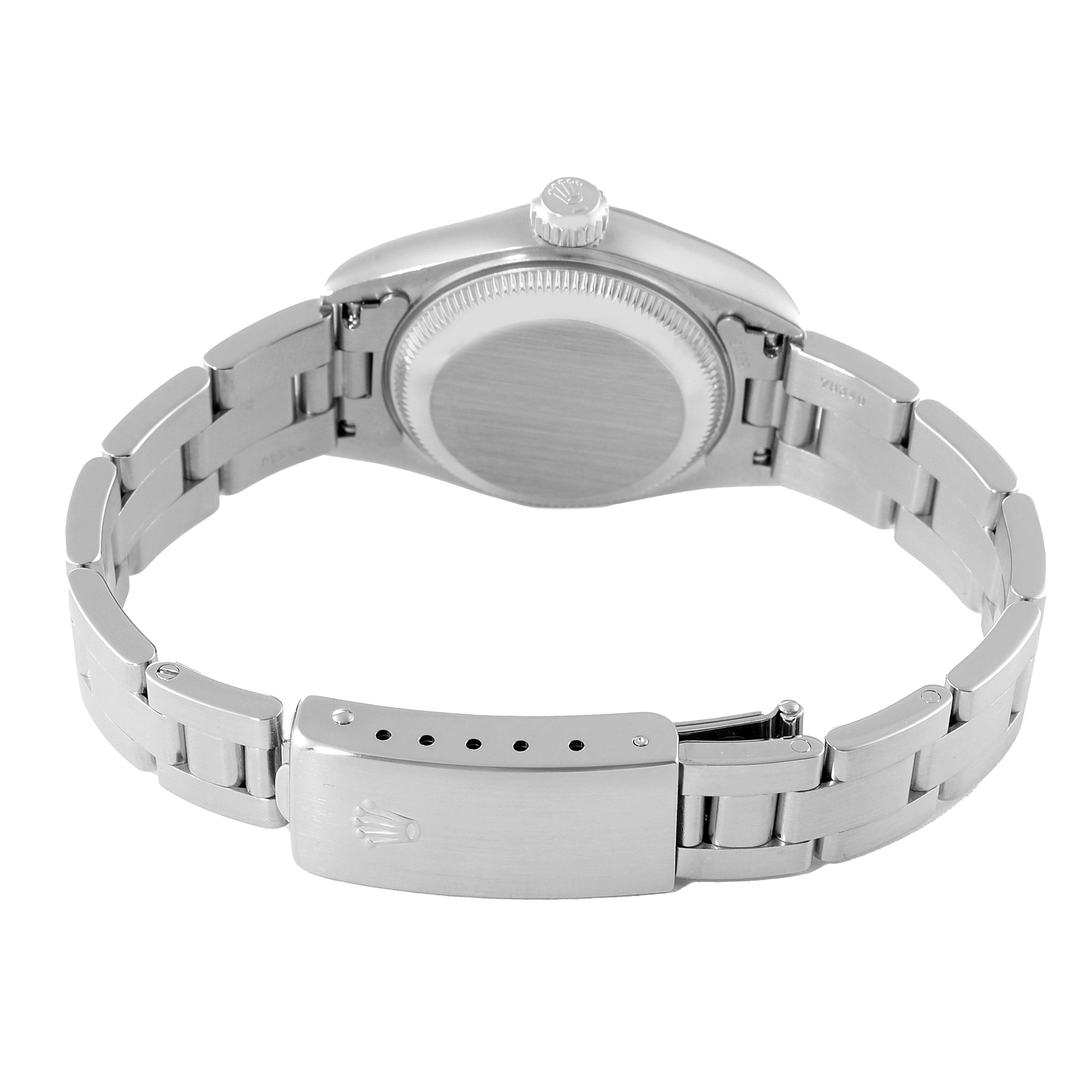 The image shows the backside and clasp of a Rolex Date 69160 Women
s Stainless Steel Silver Dial 69160 Women
s Stainless Steel Silver Dial model watch, highlighting the case back and metal bracelet.