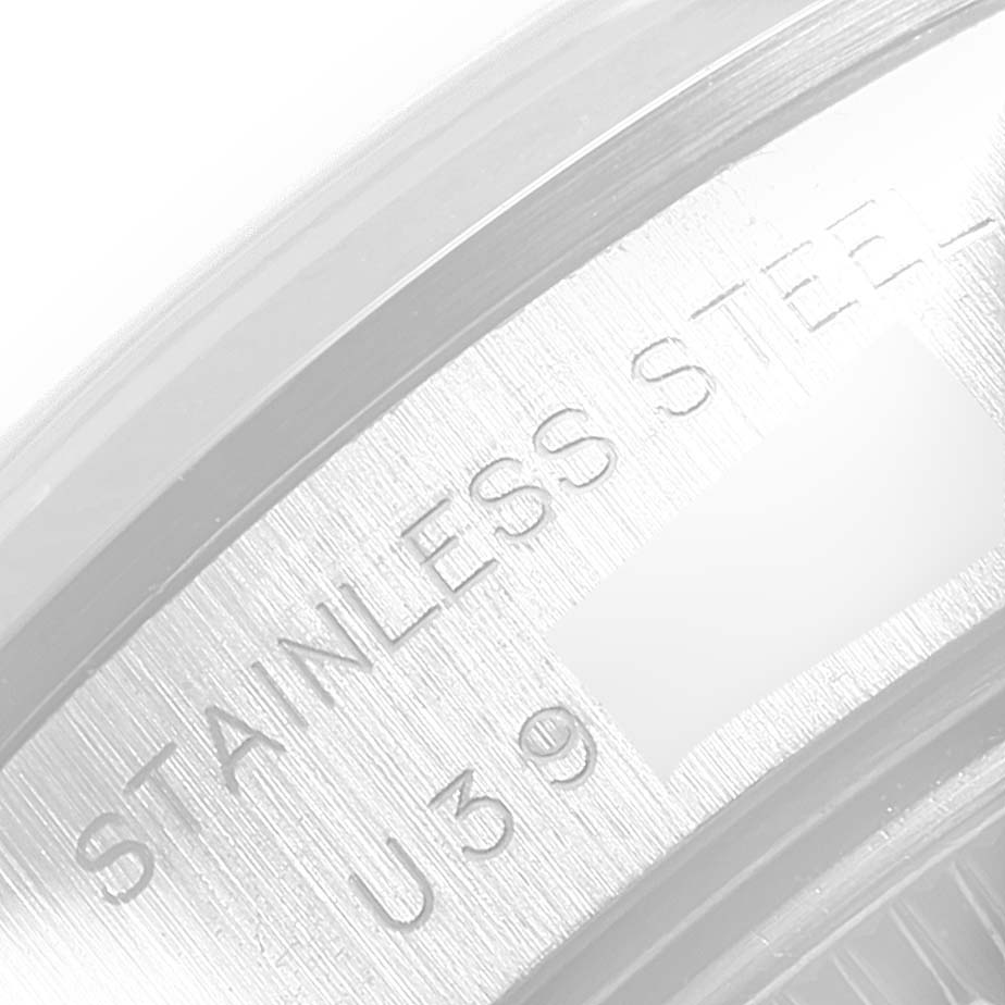 This image shows an up-close view of the engraving on the stainless steel caseback of a Rolex Date 69160 Women
s Stainless Steel Silver Dial 69160 Women
s Stainless Steel Silver Dial model watch.