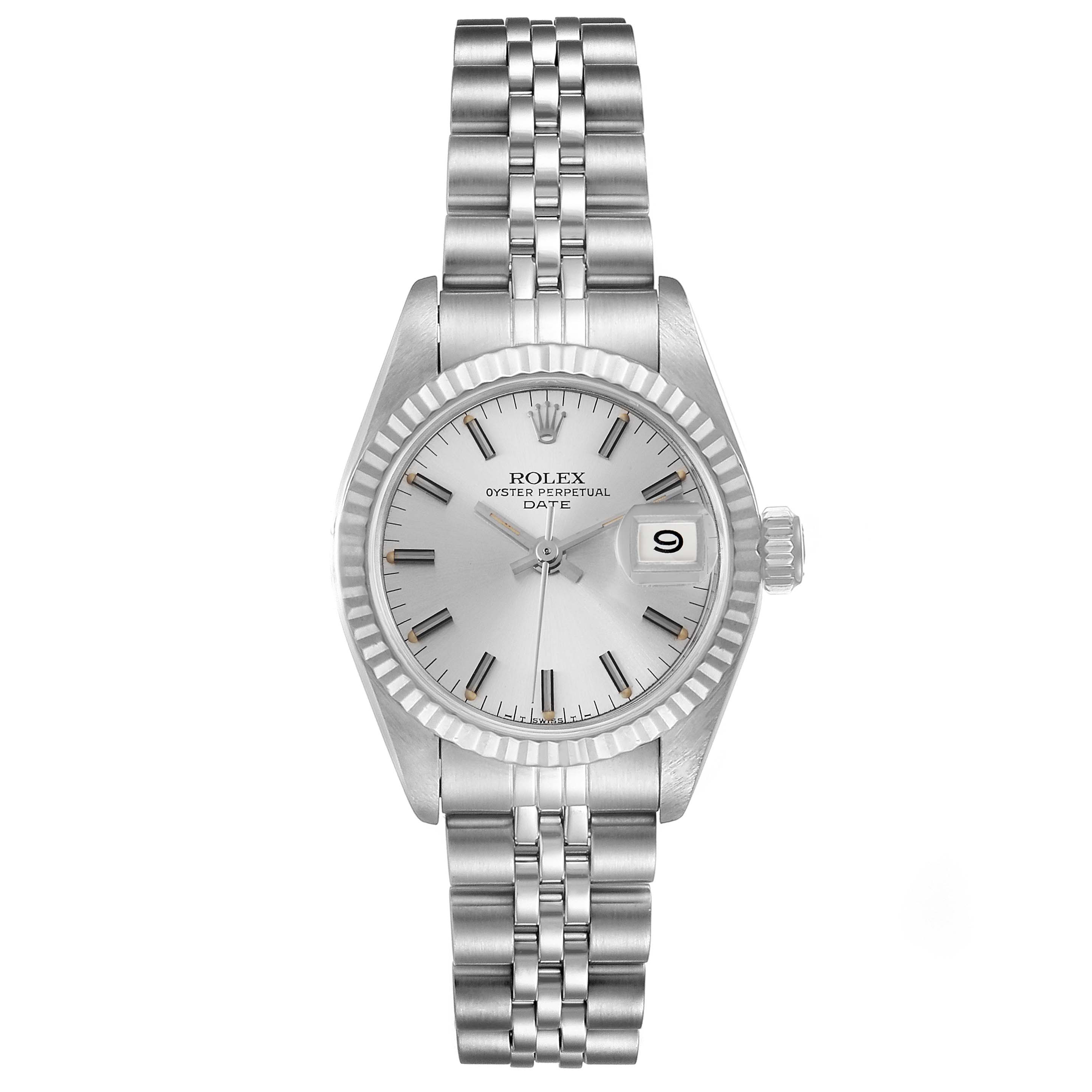 The image shows a frontal view of a Rolex Oyster Perpetual Date model watch, highlighting its face, bezel, and bracelet.
