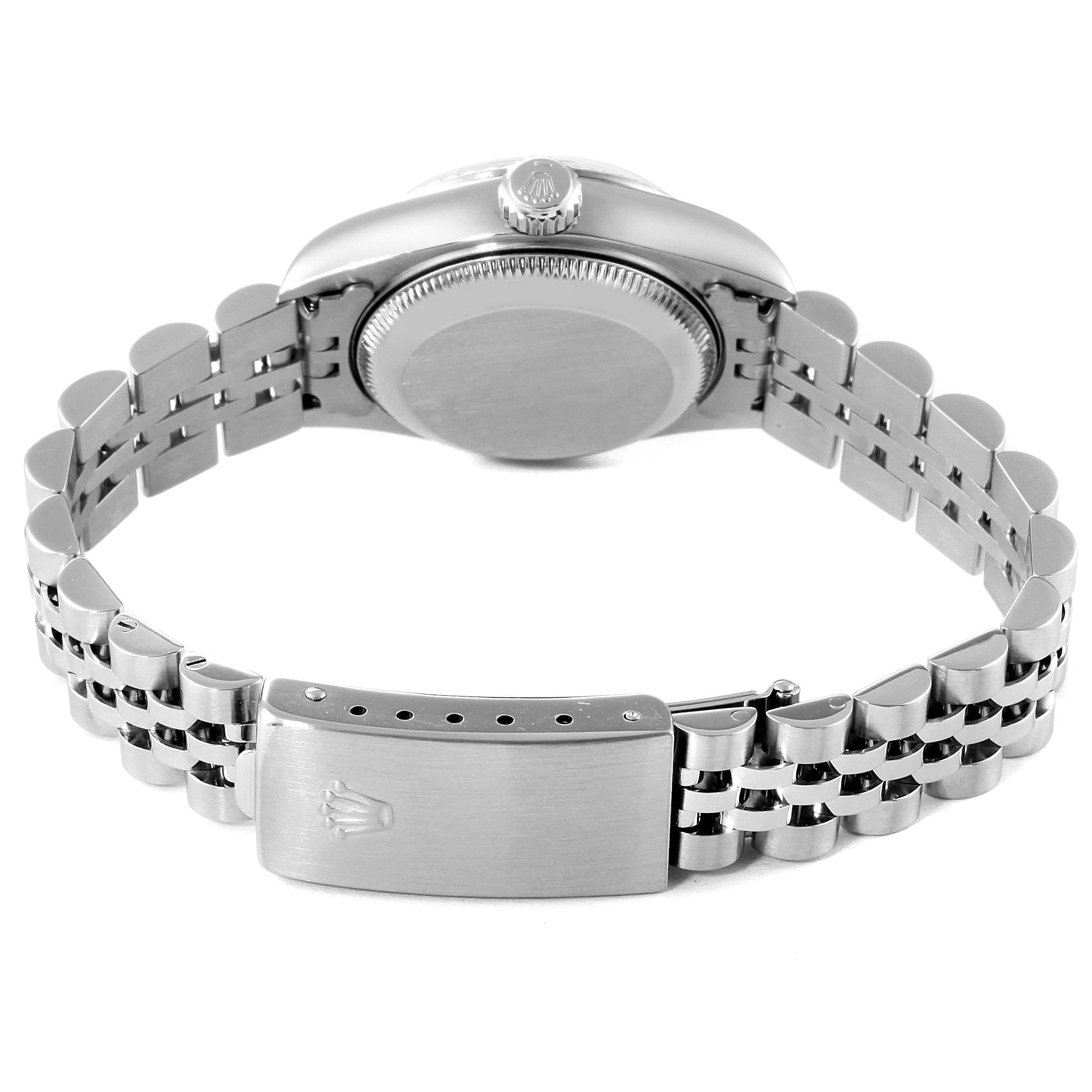 This image shows the back view of a Rolex Datejust 79174 Women's Stainless Steel Black Dial 79174 Women's Stainless Steel Black Dial watch, highlighting the case, crown, and Jubilee bracelet with clasp.