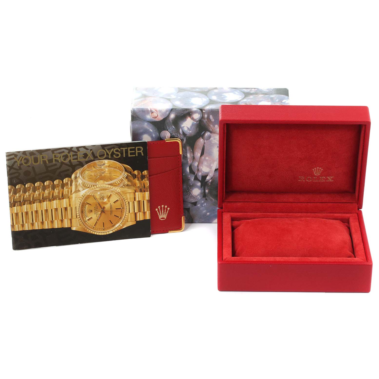 The image shows the packaging, manual, and red presentation box for a Rolex Datejust 79174 Women's Stainless Steel Black Dial 79174 Women's Stainless Steel Black Dial model watch.