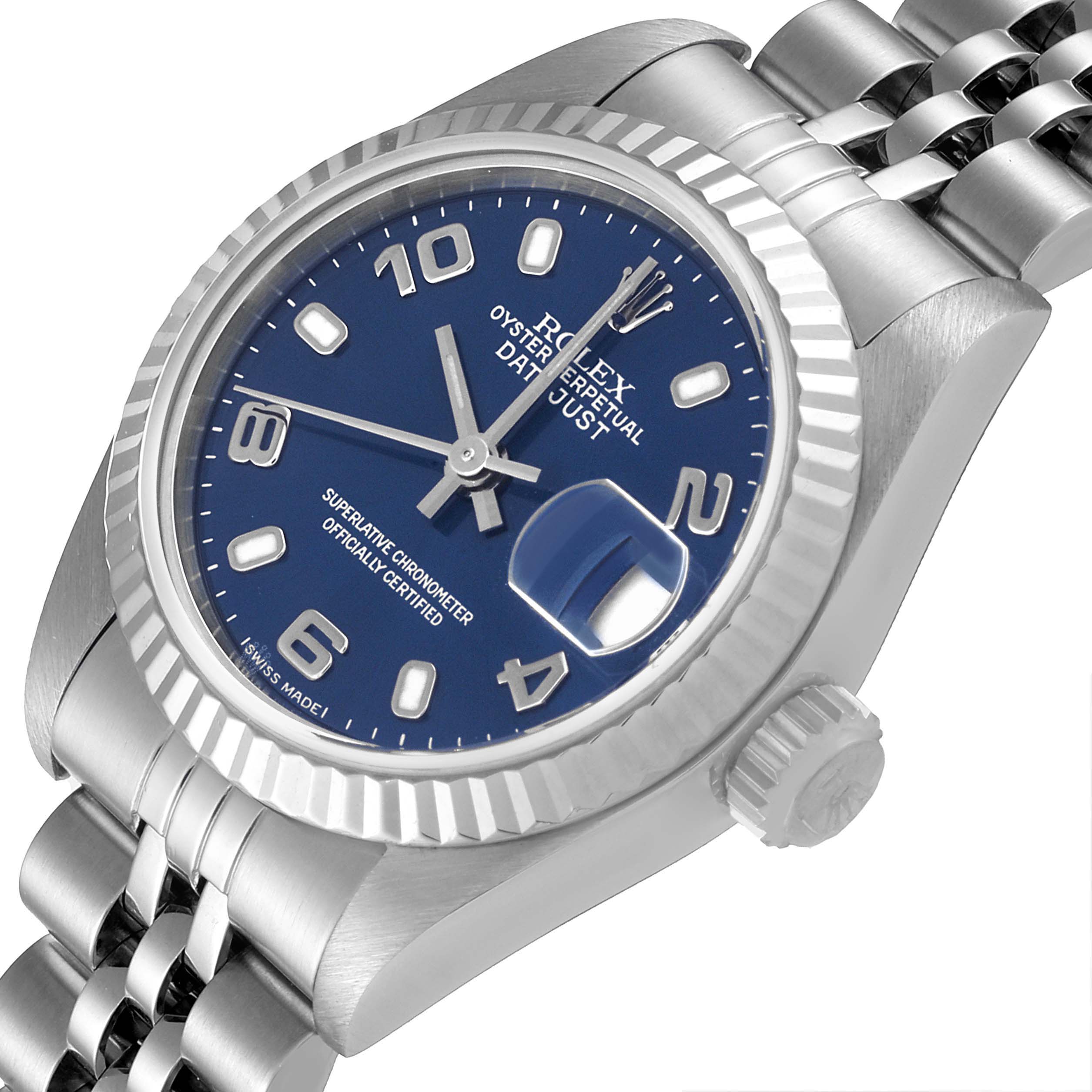 This image shows a close-up view of a Rolex Datejust 79174 Women
s Stainless Steel Blue Dial 79174 Women
s Stainless Steel Blue Dial watch, highlighting the dial, bezel, crown, and part of the bracelet.