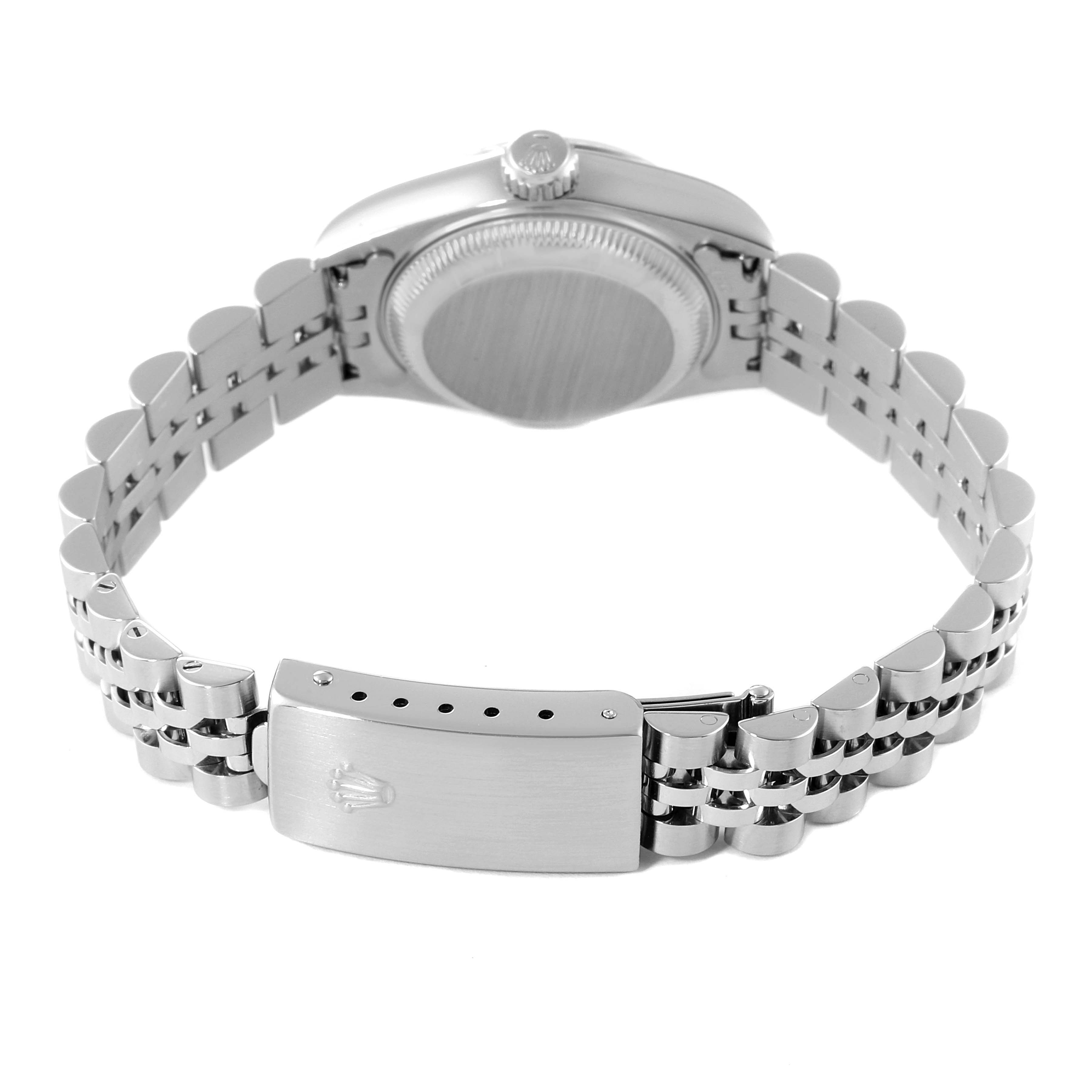 The image shows the back and clasp of the Rolex Datejust 79174 Women
s Stainless Steel Blue Dial 79174 Women
s Stainless Steel Blue Dial, highlighting its bracelet and case back.