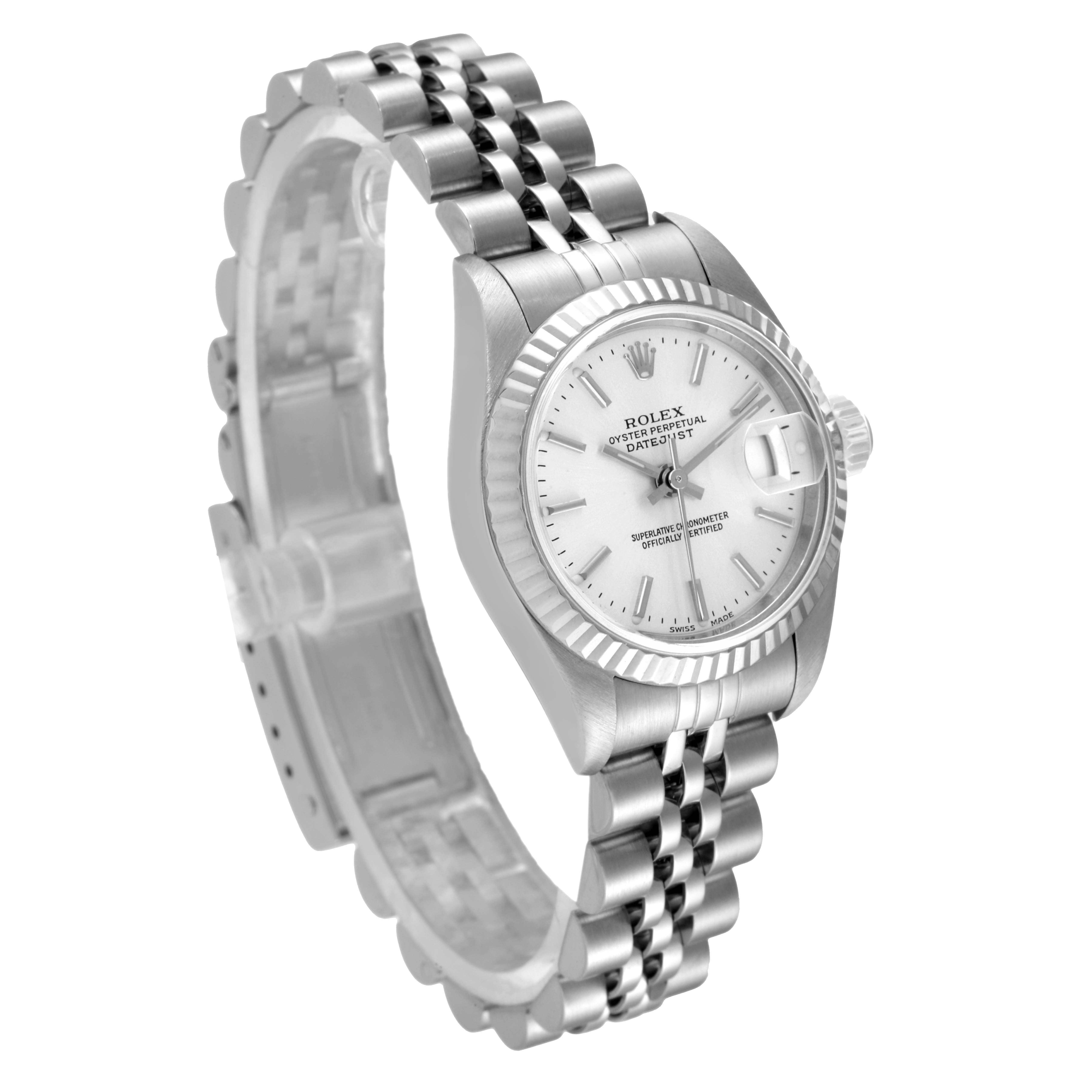 The Rolex Datejust 79174 Women
s Stainless Steel Silver Dial 79174 Women
s Stainless Steel Silver Dial watch is angled to show the face, bezel, crown, and partially open bracelet.