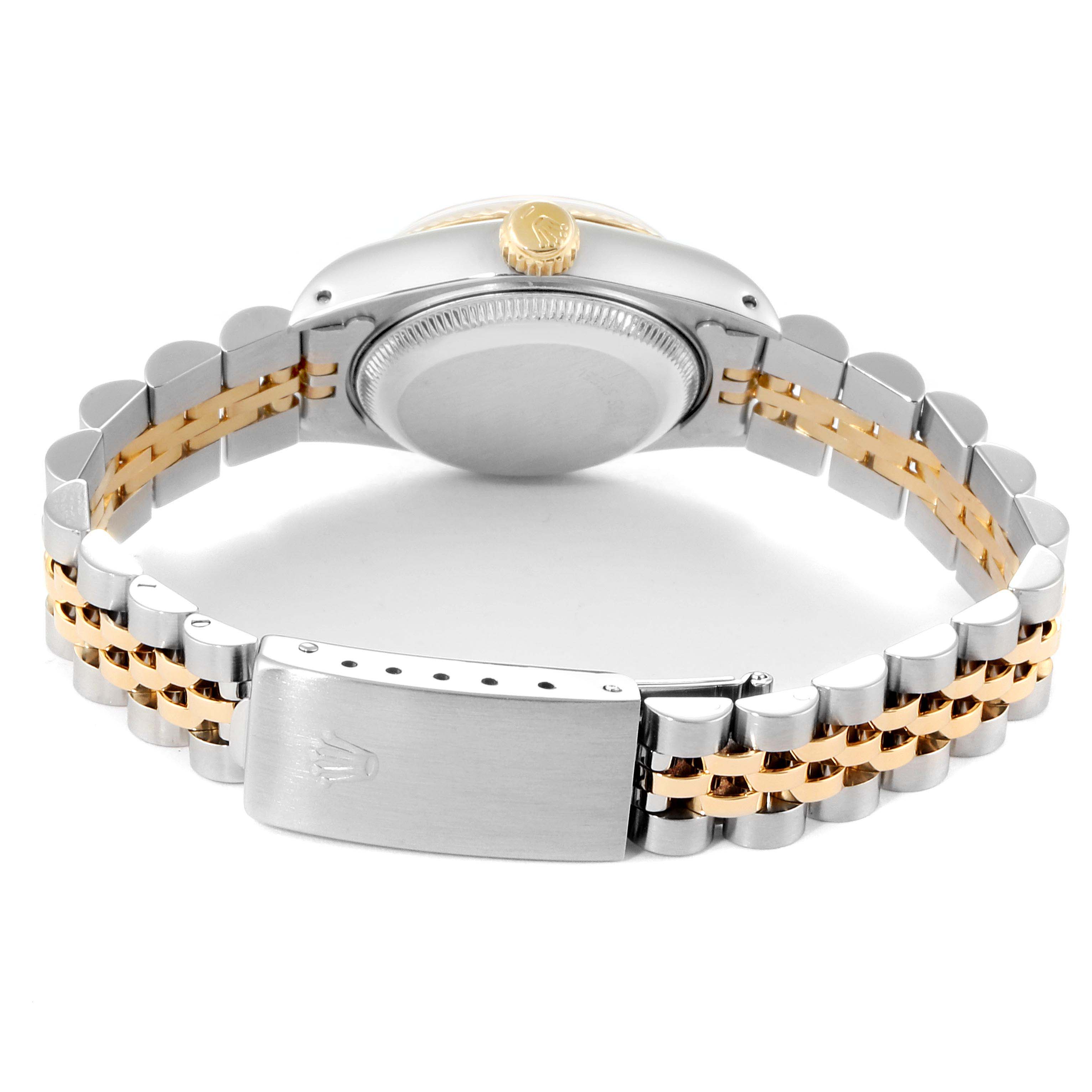 This image shows the back view of a Rolex Datejust 69173 Women
s Steel and Gold (two tone) Champagne Dial 69173 Women
s Steel and Gold (two tone) Champagne Dial watch, highlighting the clasp, bracelet, and caseback.