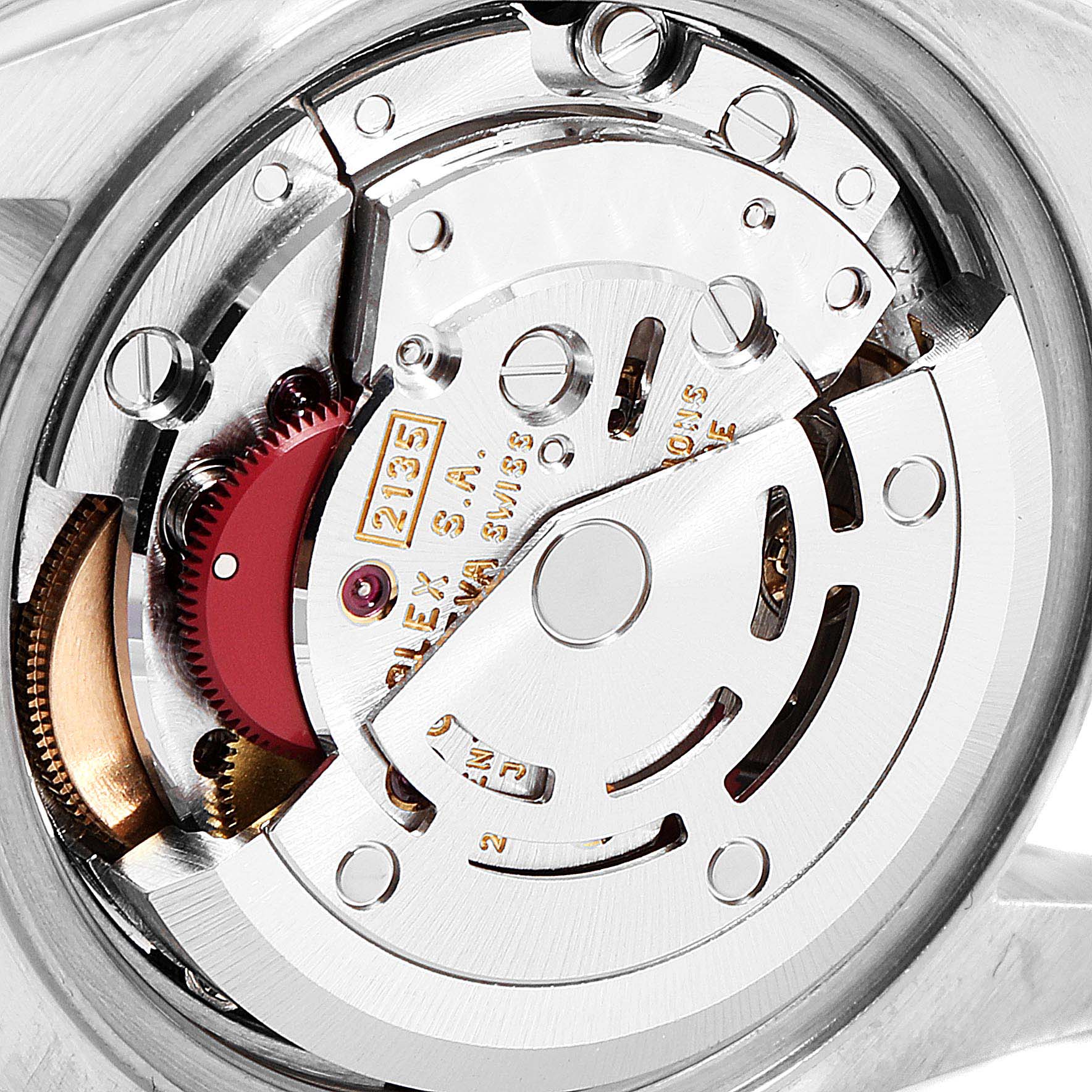 The image shows the intricate internal mechanism of a Rolex Datejust 69173 Women
s Steel and Gold (two tone) Champagne Dial 69173 Women
s Steel and Gold (two tone) Champagne Dial model watch from a close-up angle.