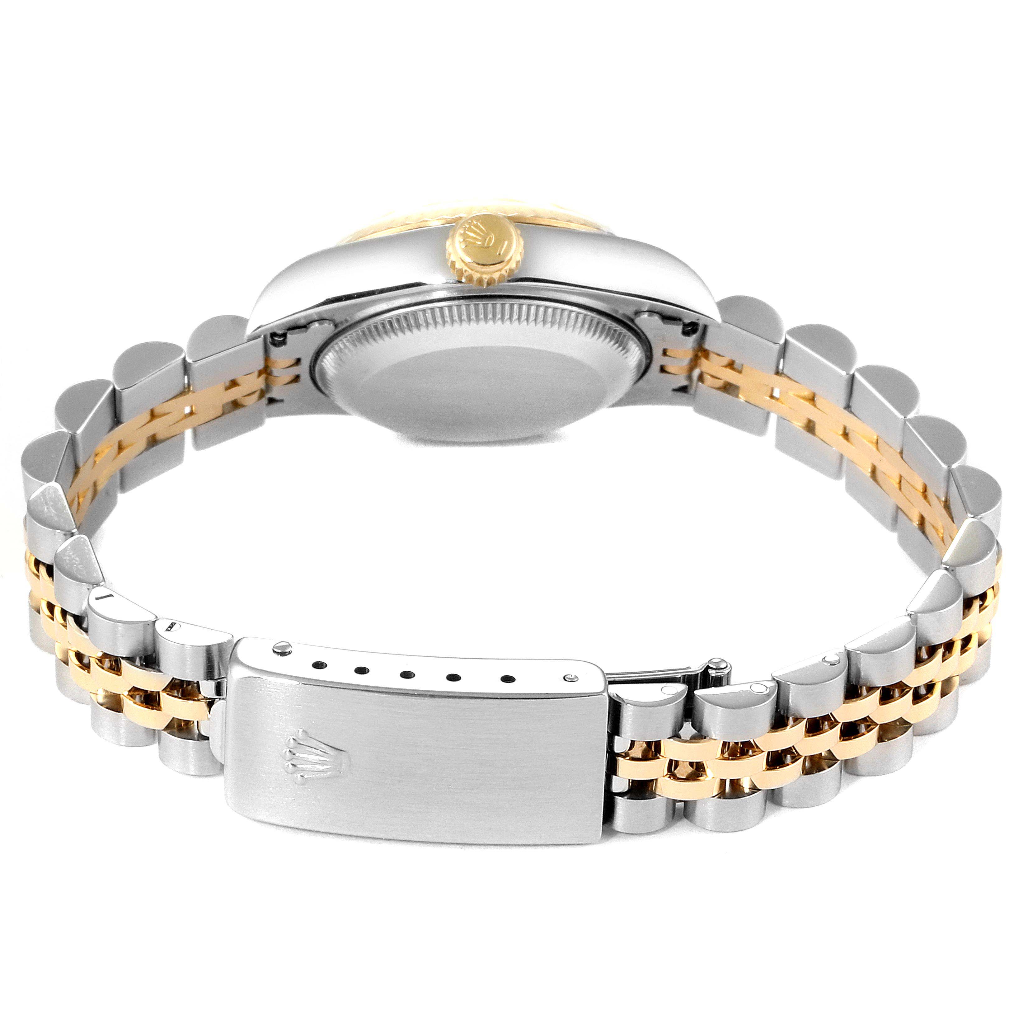 The image shows the back and side view of a Rolex Datejust 69173 Women
s Steel and Gold (two tone) Champagne Dial 69173 Women
s Steel and Gold (two tone) Champagne Dial watch, focusing on its bracelet, clasp, and case back.