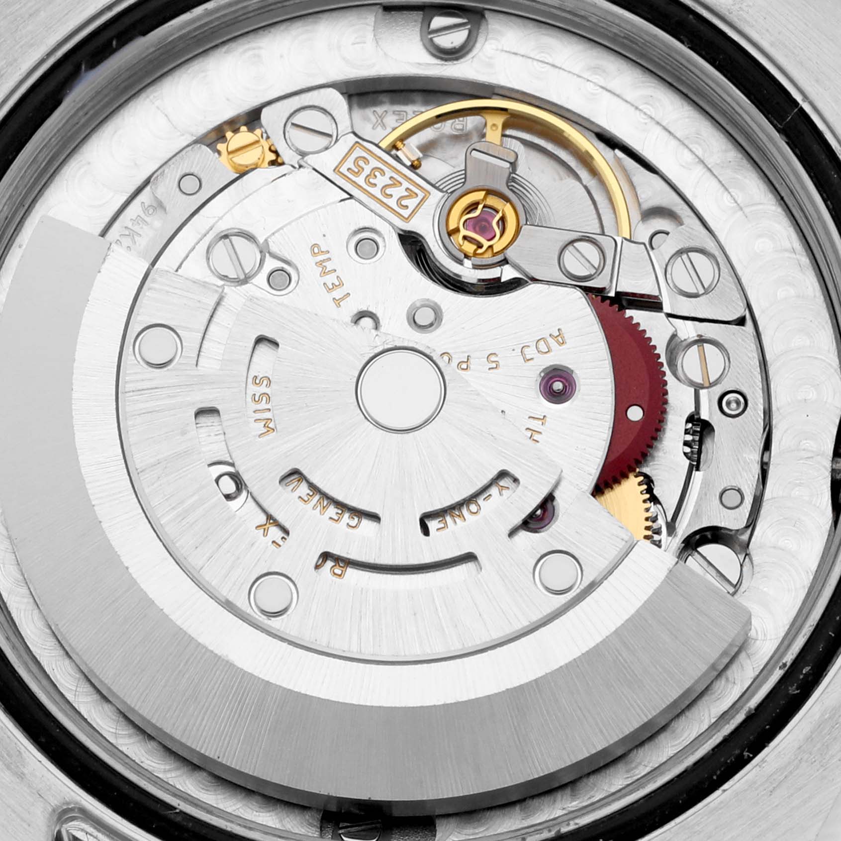 This close-up image shows the intricate internal mechanism of a Rolex Datejust 178343 Women's Steel and Gold (two tone) White Dial 178343 Women's Steel and Gold (two tone) White Dial watch.
