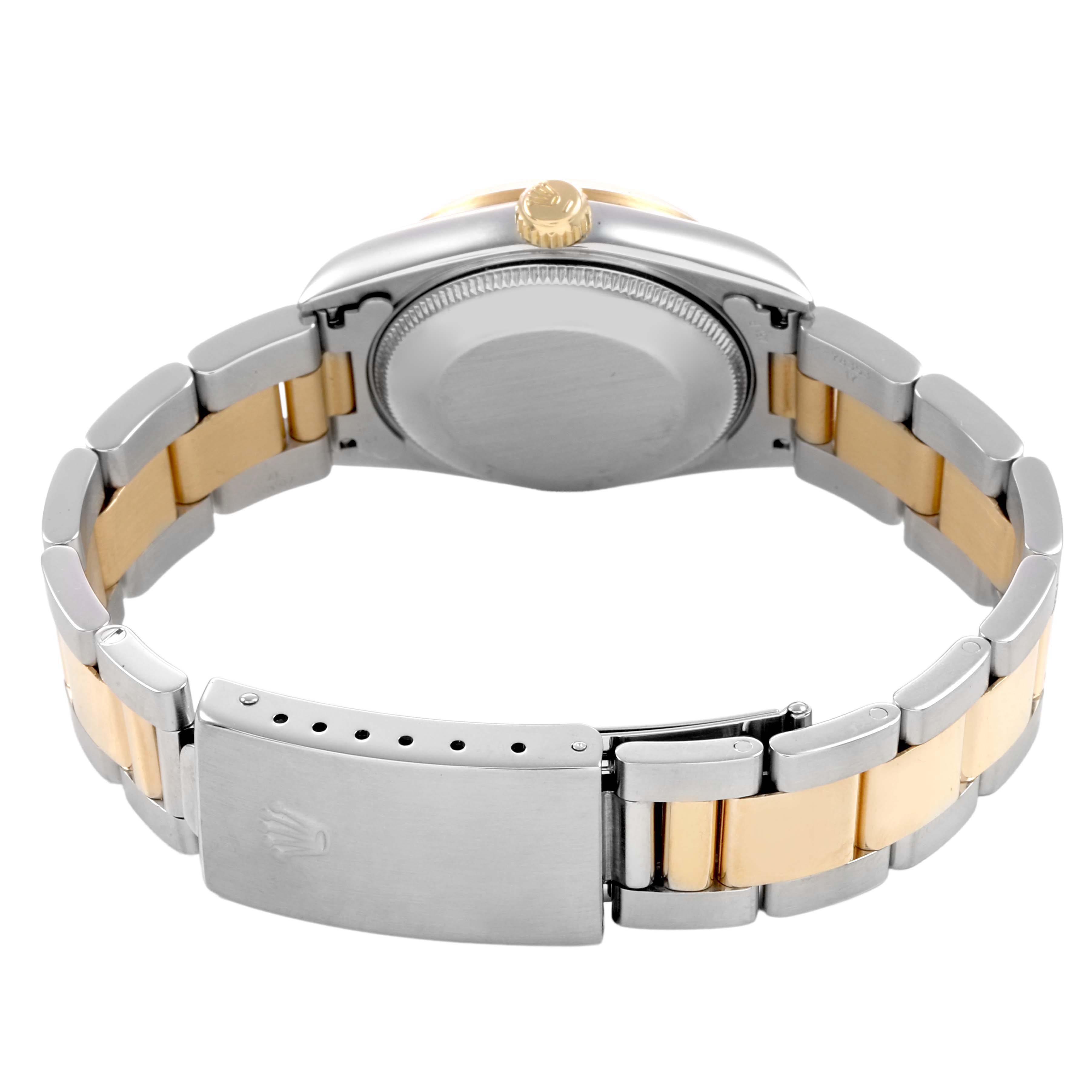 The Rolex Mid-Size 78243 Women's Steel and Gold (two tone) White Dial watch is shown from the back, displaying the closed clasp, bracelet, and case back.