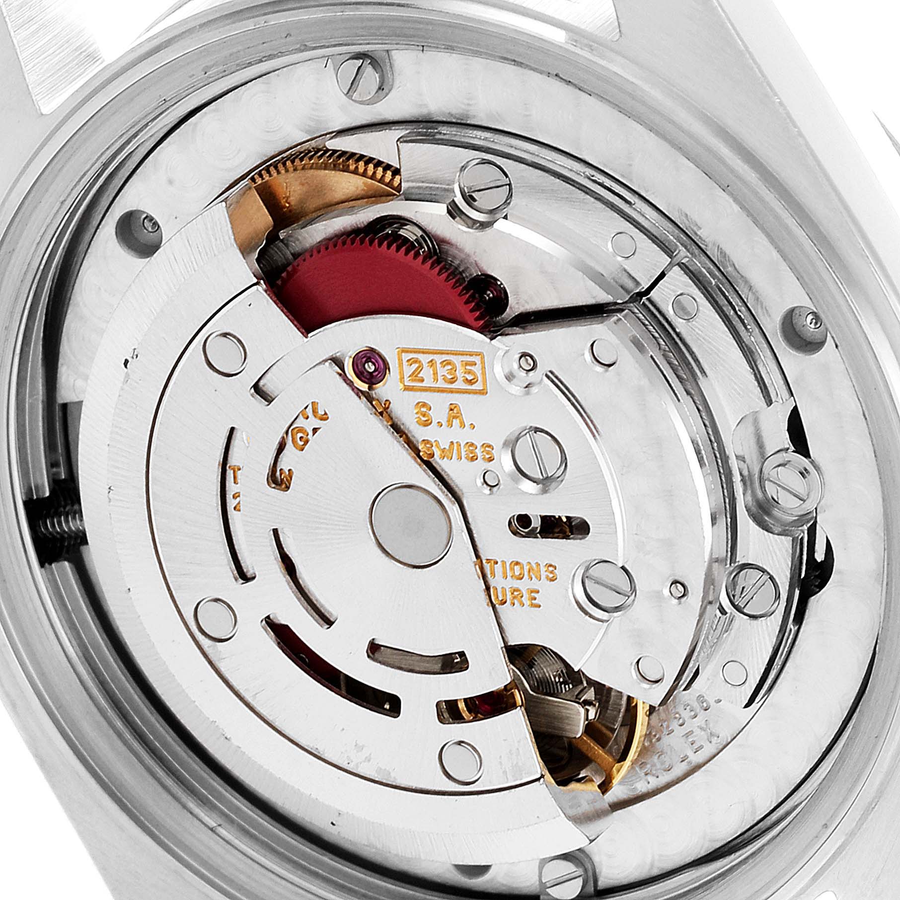 This image shows a close-up view of the movement mechanism inside a Rolex Mid-Size 68273 Women
s Steel and Gold (two tone) Silver Dial 68273 Women
s Steel and Gold (two tone) Silver Dial watch.