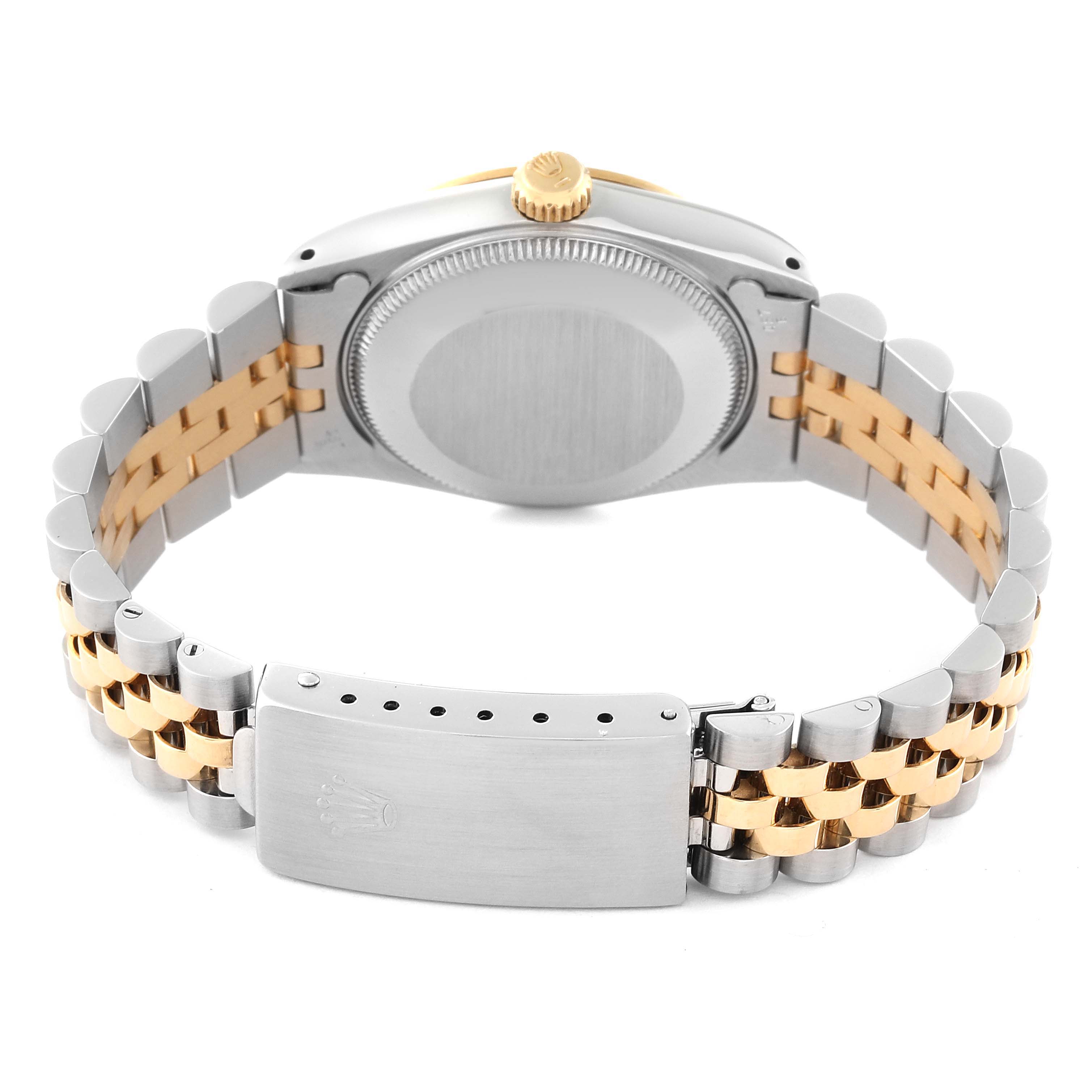 This image shows the back and side of a Rolex Mid-Size 68273 Women's Steel and Gold (two tone) Black Dial 68273 Women's Steel and Gold (two tone) Black Dial model, highlighting the clasp and two-tone bracelet.