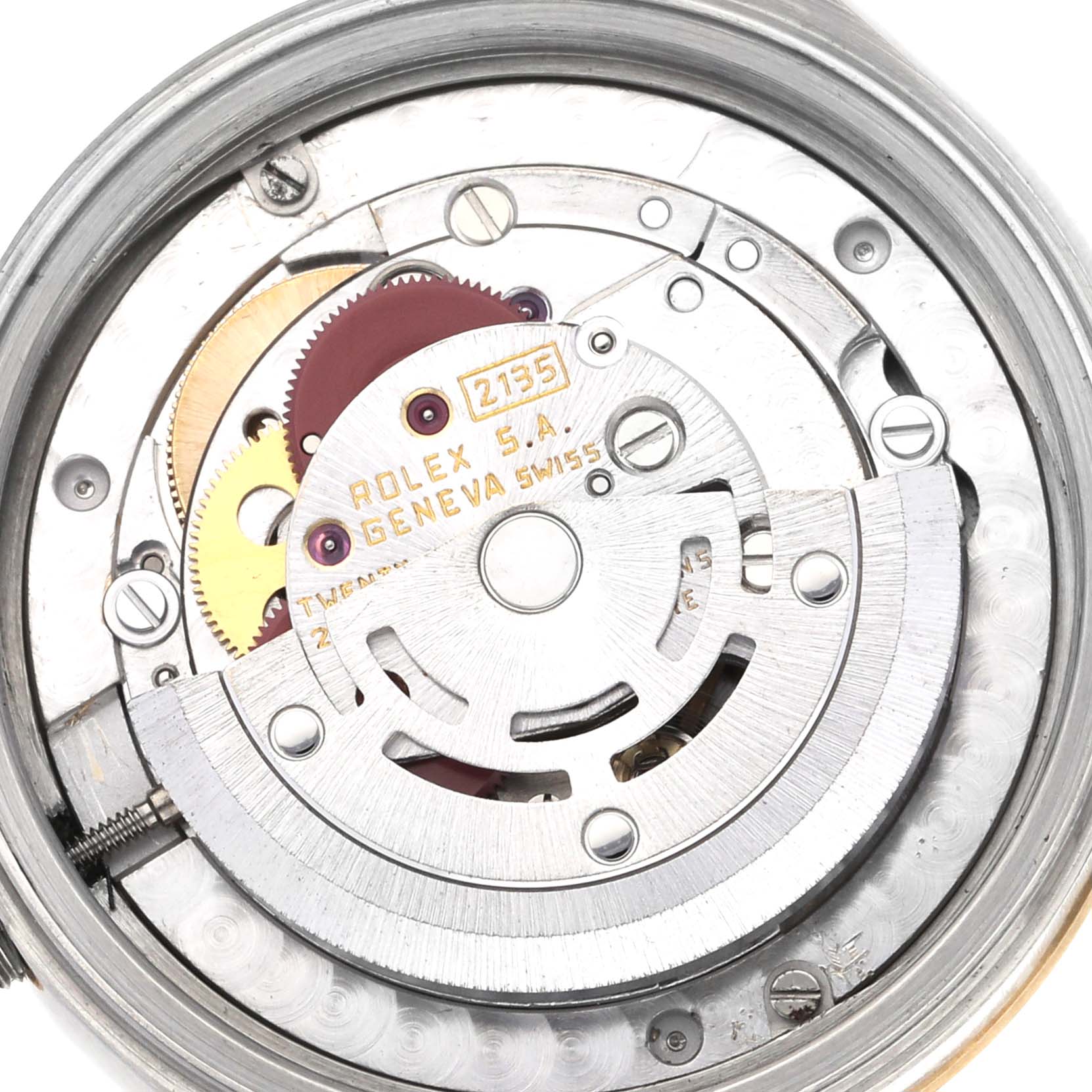 This image shows the internal movement mechanism of a Mid-Size Rolex watch, highlighting gears and components.