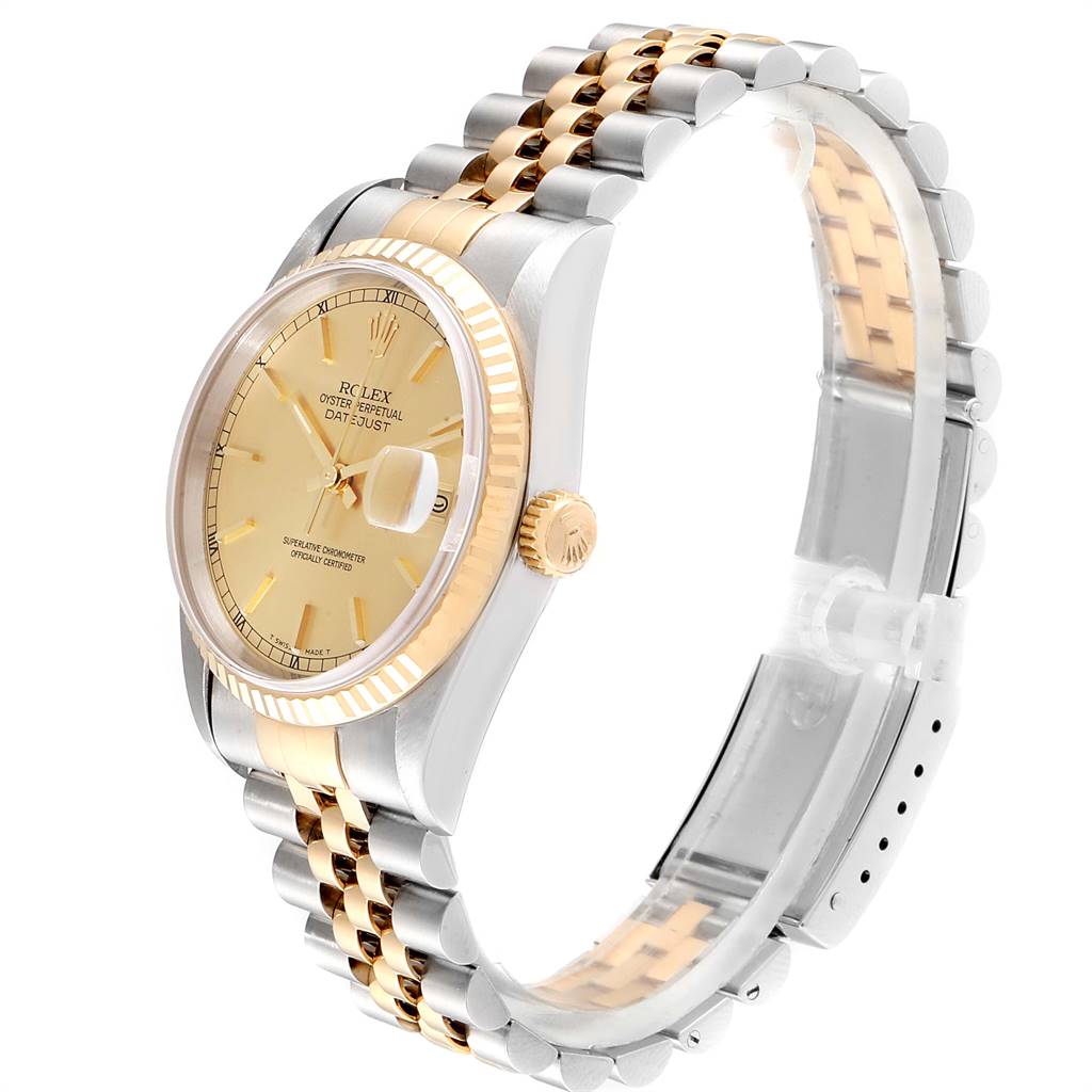 The image displays a Rolex Datejust 16233 Men
s Steel and Gold (two tone) Champagne Dial 16233 Men
s Steel and Gold (two tone) Champagne Dial watch at an angle showing its face, gold fluted bezel, and two-tone bracelet.