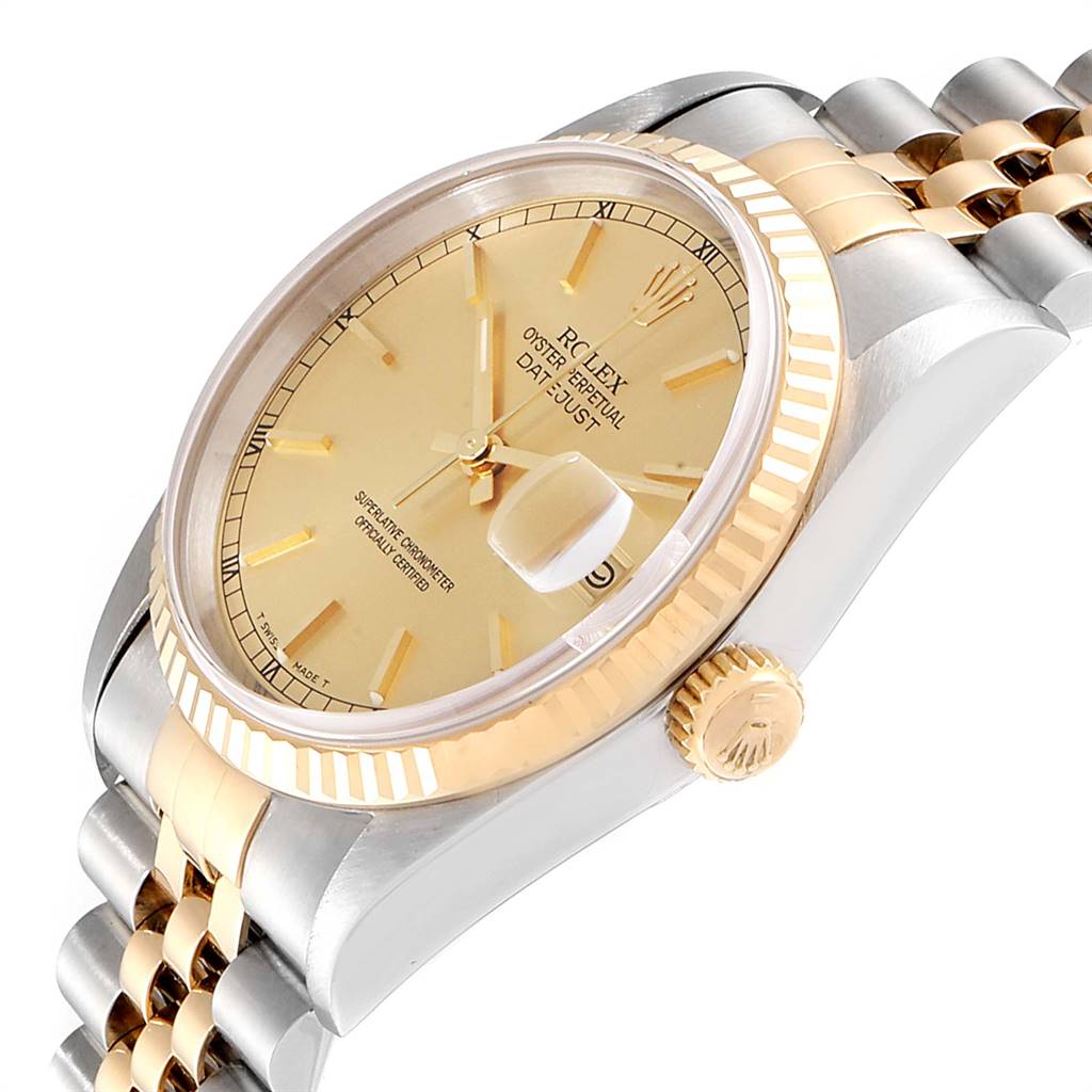 This image shows a close-up side angle of a Rolex Datejust 16233 Men
s Steel and Gold (two tone) Champagne Dial 16233 Men
s Steel and Gold (two tone) Champagne Dial watch, highlighting the dial, crown, bezel, and part of the bracelet.