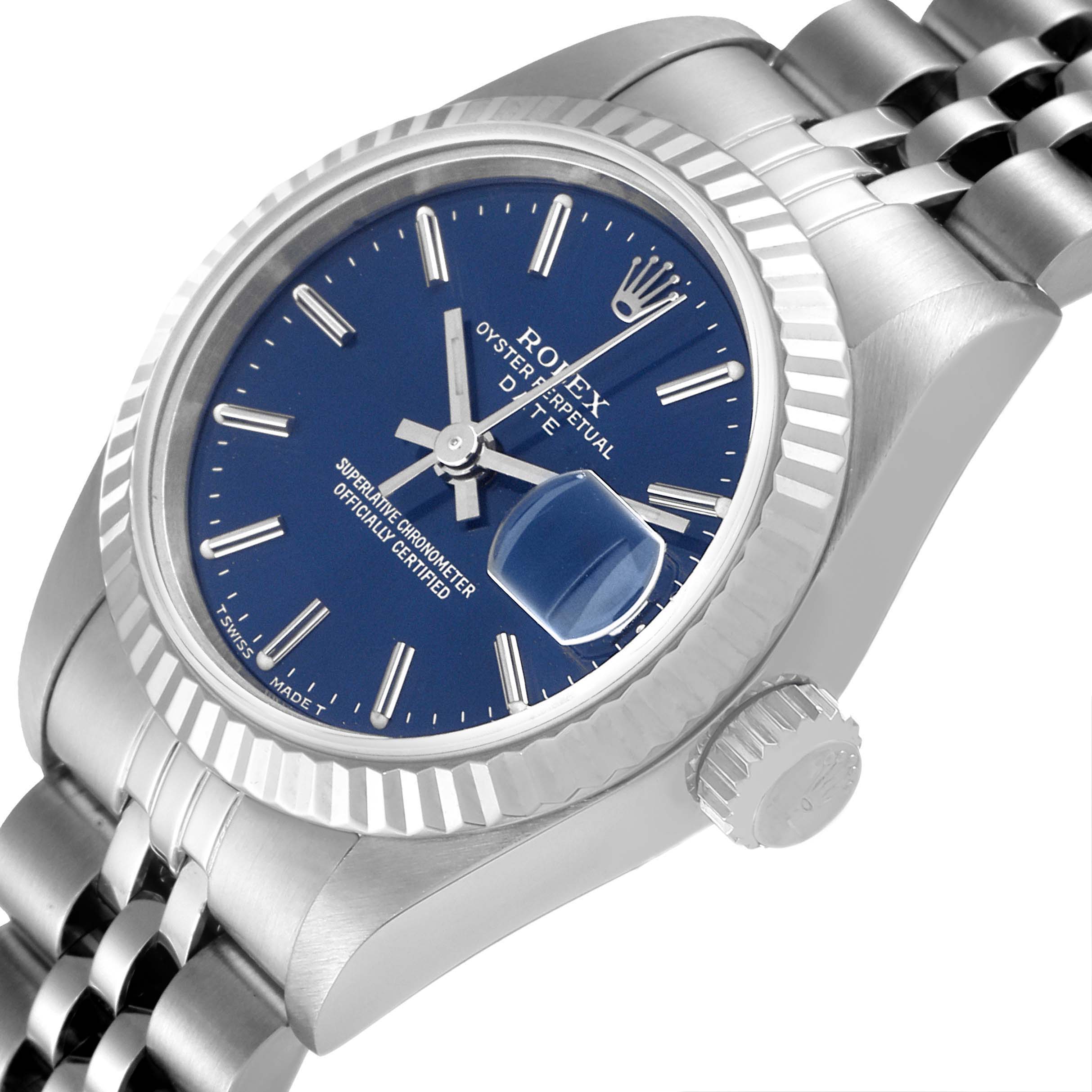 This image shows the face, bezel, crown, and bracelet of a Rolex Datejust 69174 Women's Stainless Steel Blue Dial 69174 Women's Stainless Steel Blue Dial watch at an angled side view.