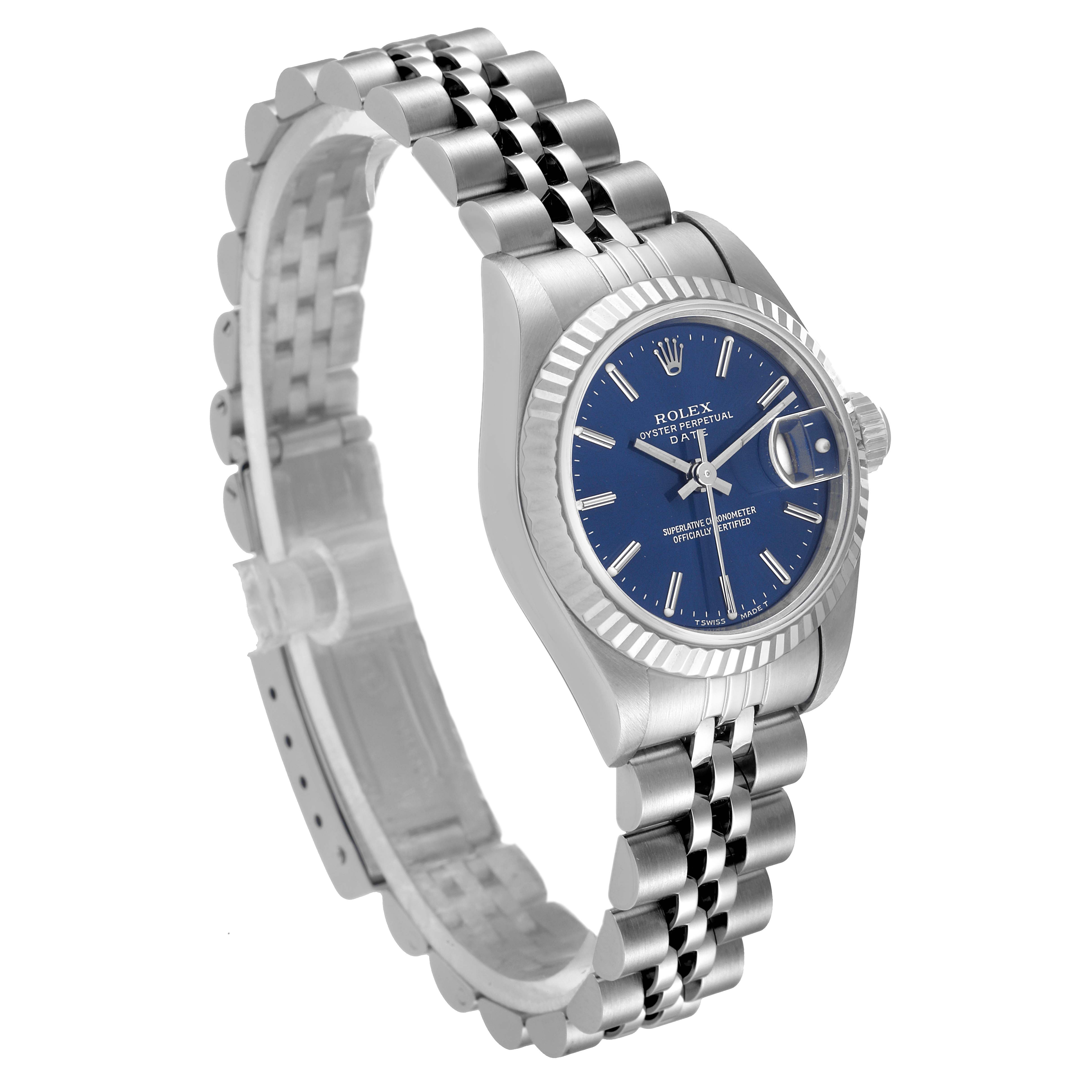 This image shows a Rolex Datejust 69174 Women's Stainless Steel Blue Dial 69174 Women's Stainless Steel Blue Dial watch at an angle displaying the side, face, and partial bracelet.