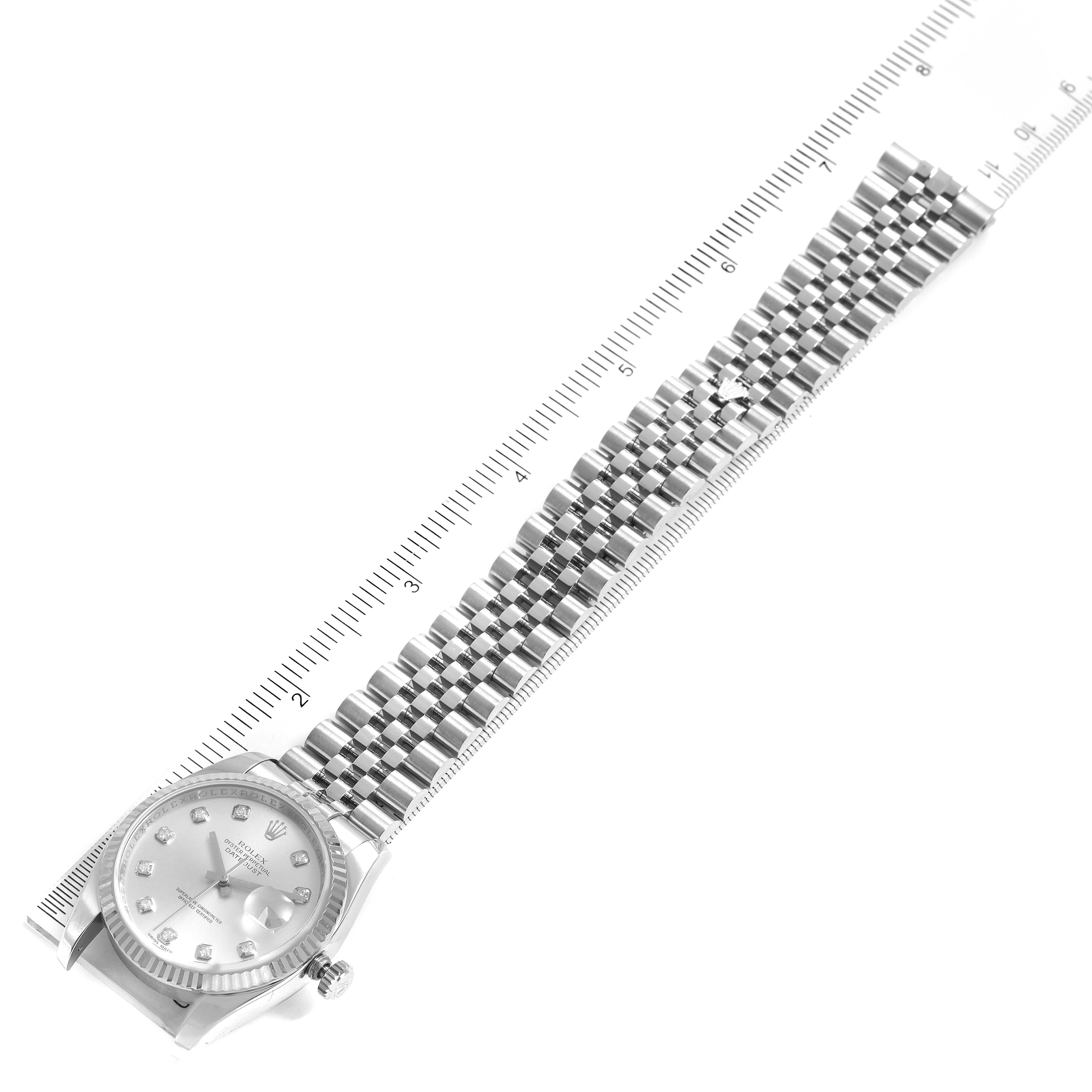 The image shows a top view of a Rolex Datejust 116234 Men's Stainless Steel Silver Dial 116234 Men's Stainless Steel Silver Dial watch, including the face and the full length of the bracelet against a ruler for scale.