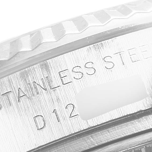 This image shows a close-up of the stainless steel bezel and etching on a Rolex Datejust 179174 Women
s Stainless Steel Silver Dial 179174 Women
s Stainless Steel Silver Dial watch.