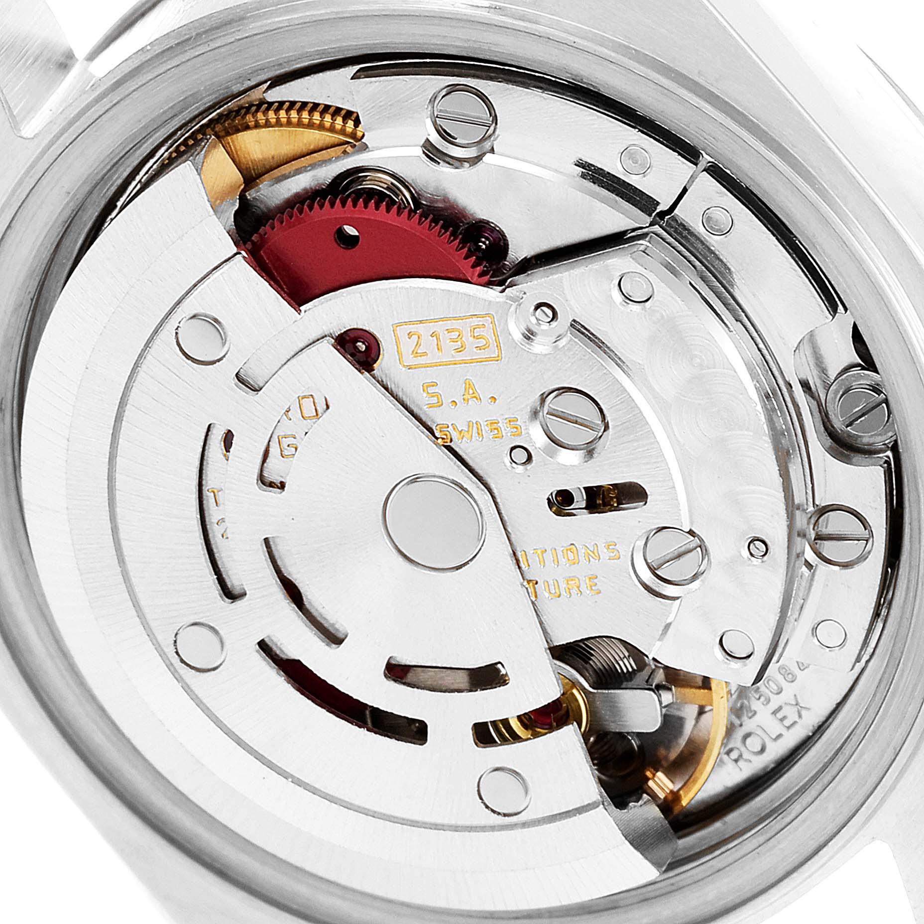 This image shows a close-up of the Rolex Datejust 69174 Women
s Stainless Steel Silver Dial 69174 Women
s Stainless Steel Silver Dial
s internal mechanism from the back, highlighting its movement components.