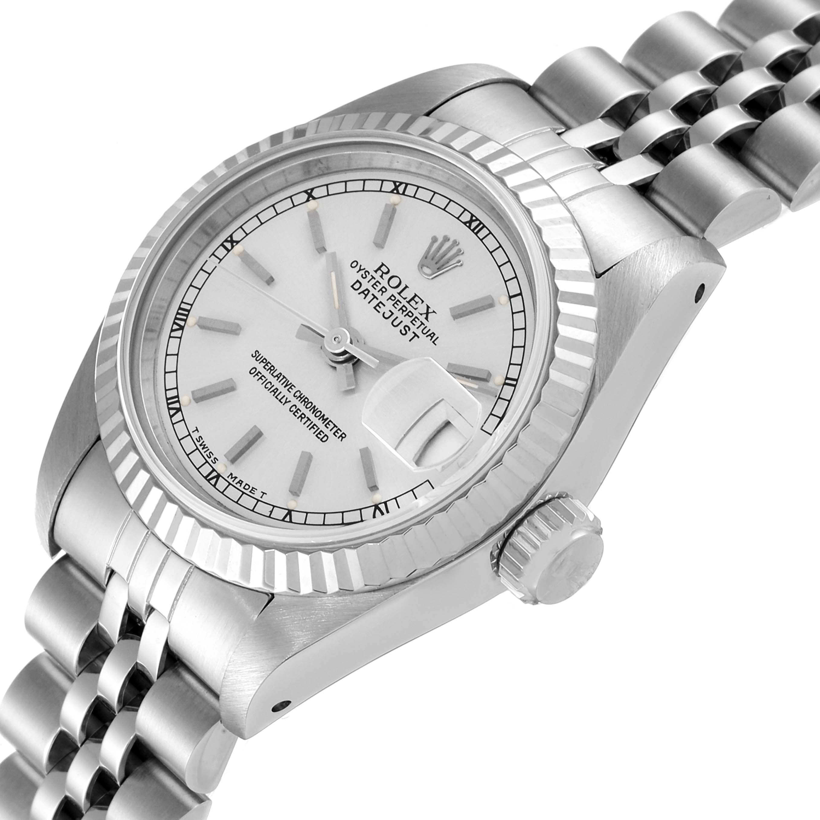 The image shows a Rolex Datejust 69174 Women
s Stainless Steel Silver Dial 69174 Women
s Stainless Steel Silver Dial watch at an angled view, highlighting the face, bezel, crown, and part of the bracelet.