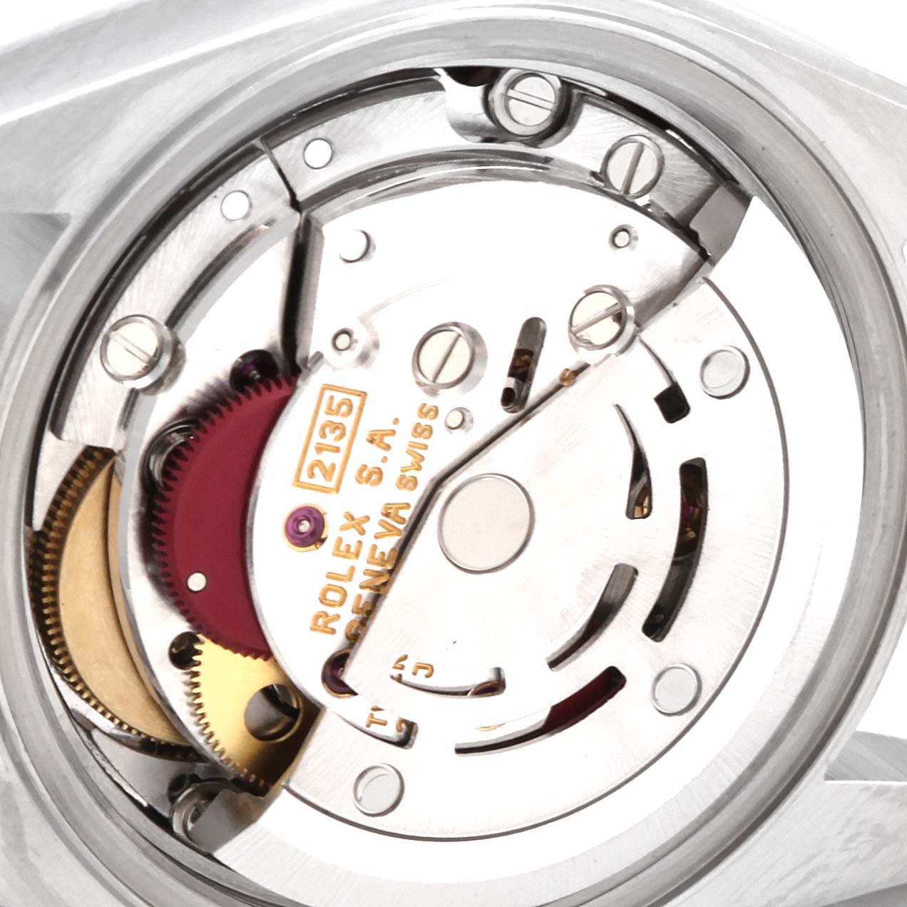 The image shows a close-up view of the movement mechanism inside a Rolex Datejust 69174 Women
s Stainless Steel Silver Dial 69174 Women
s Stainless Steel Silver Dial watch, highlighting its internal components.