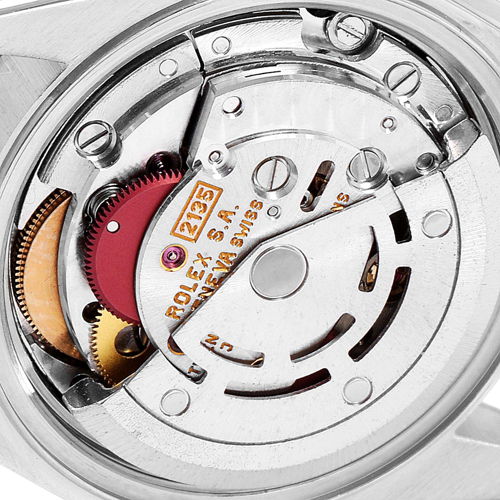 The image shows a close-up view of the Datejust model
s Rolex movement mechanism.