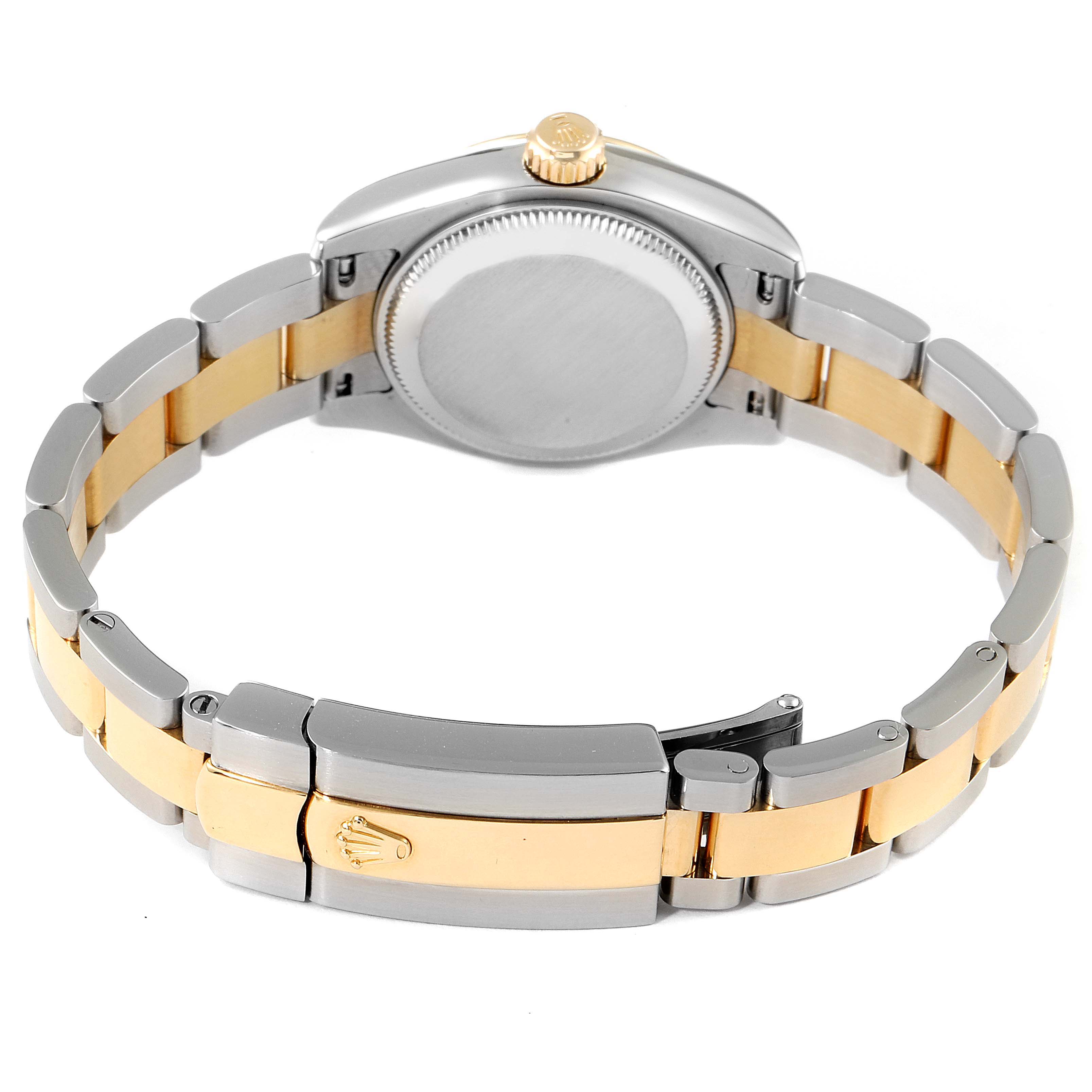 This image shows the back and clasp of a Rolex Datejust 179173 Women's Steel and Gold (two tone) Mother of Pearl Dial 179173 Women's Steel and Gold (two tone) Mother of Pearl Dial watch with a two-tone metal band.