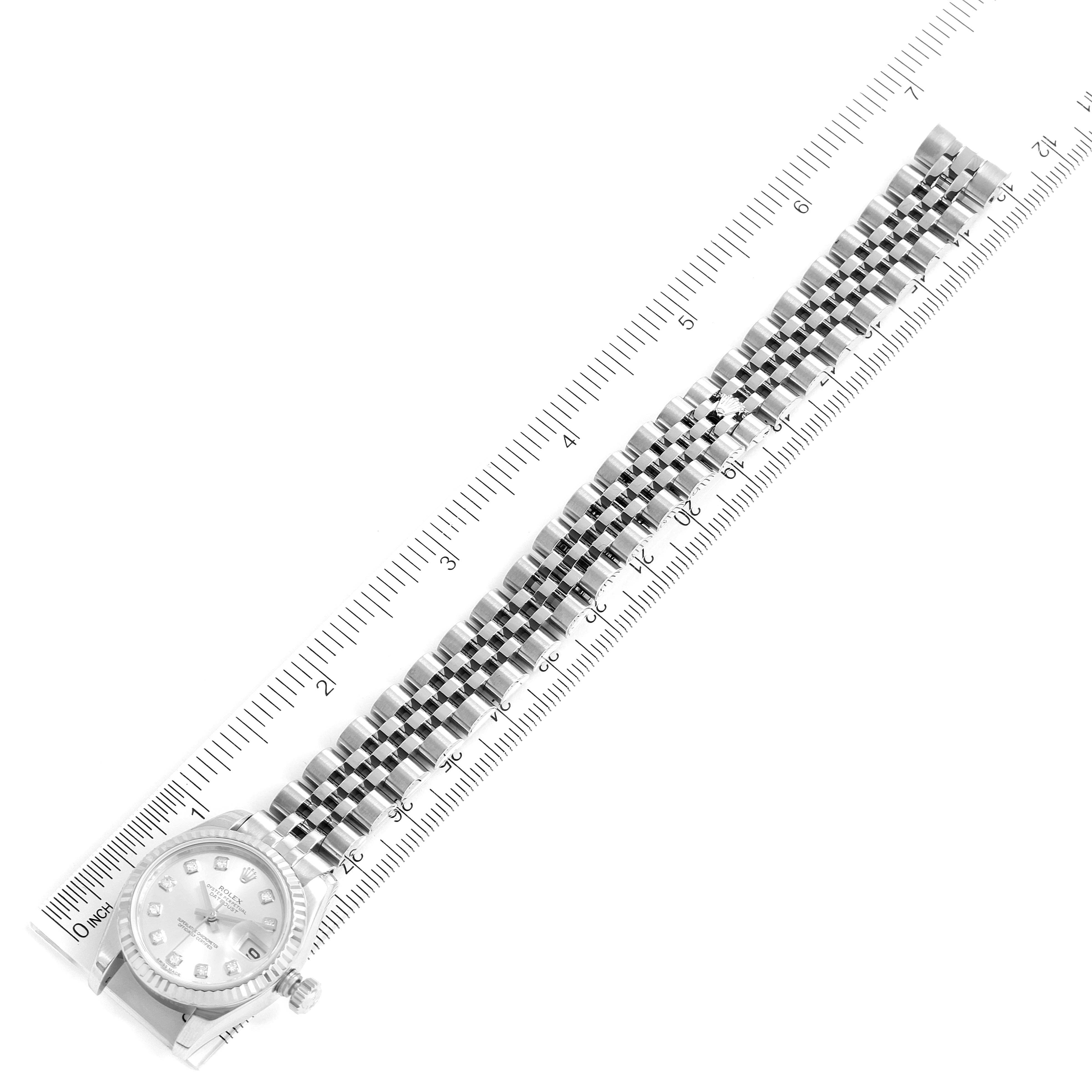 The image shows a Rolex Datejust 179174 Women's Stainless Steel Silver Dial 179174 Women's Stainless Steel Silver Dial watch laying flat beside a ruler, highlighting the band length.