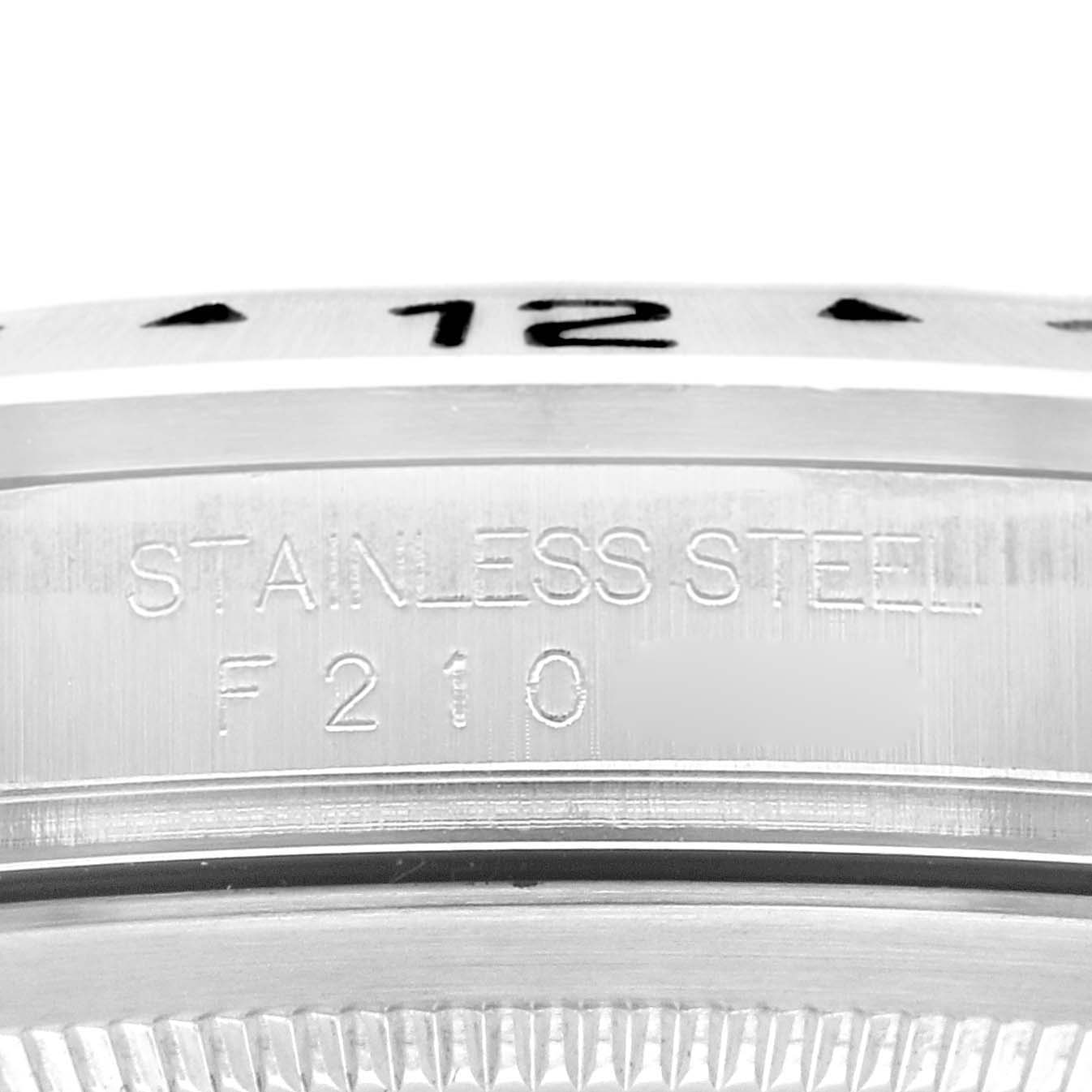 Close-up of the Rolex Explorer 16570 Men's Stainless Steel Black Dial 16570 Men's Stainless Steel Black Dial watch bezel and case side, highlighting the "STAINLESS STEEL" engraving.