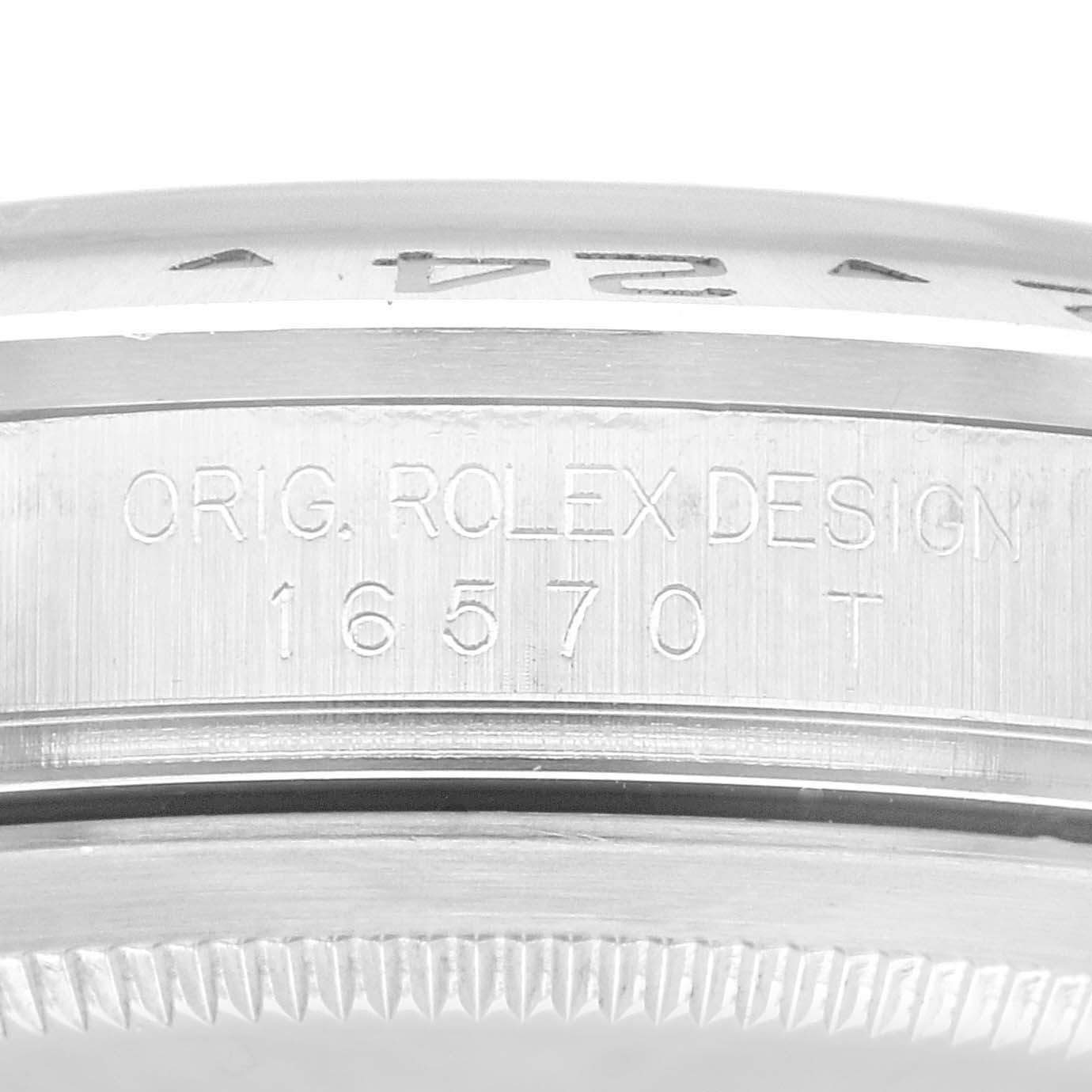 The image shows a close-up of the engraved bezel and the edge of the case of a Rolex Explorer 16570 Men's Stainless Steel Black Dial 16570 Men's Stainless Steel Black Dial watch with the model number 16570.