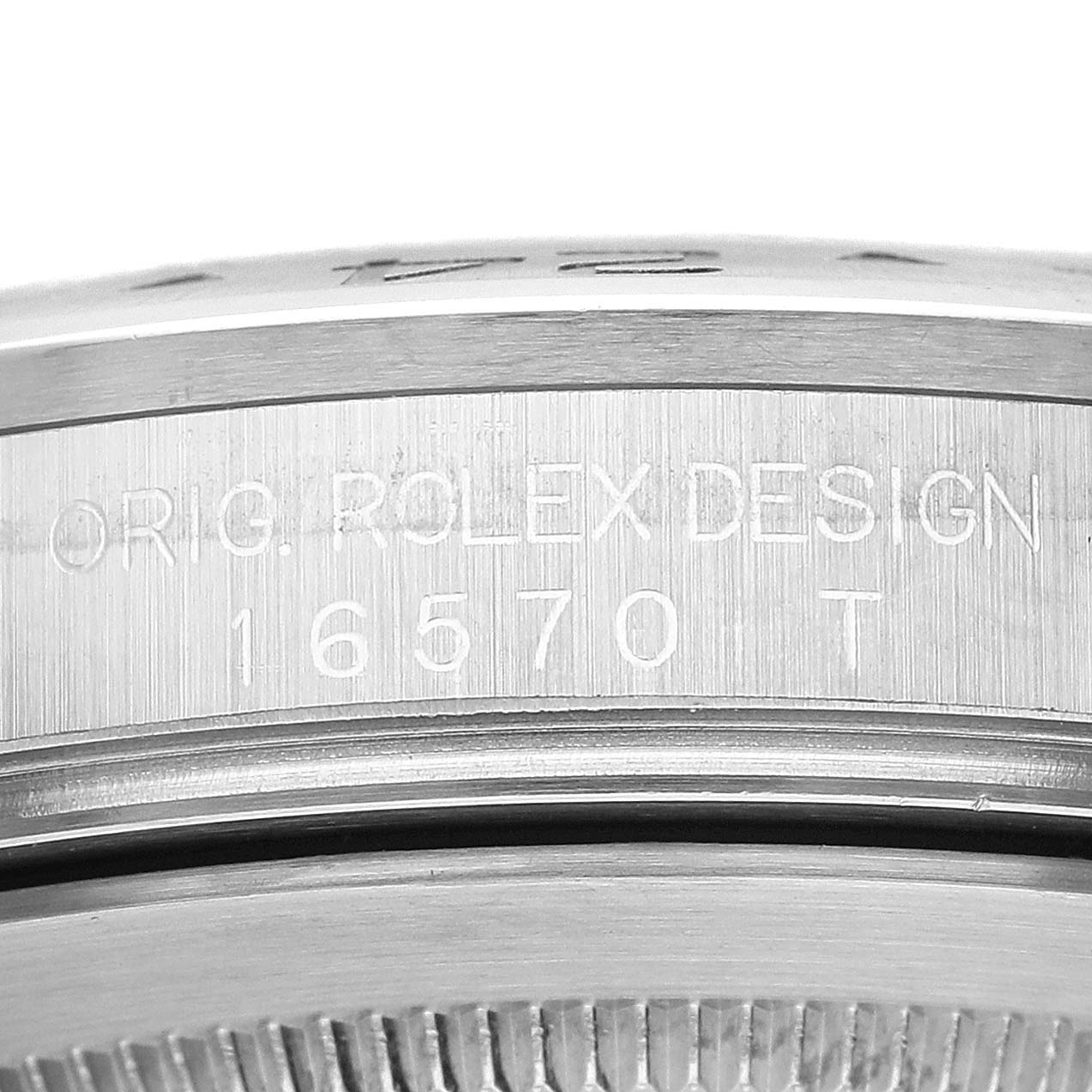 This is a close-up view of the case side of a Rolex Explorer 16570 Men
s Stainless Steel Black Dial 16570 Men
s Stainless Steel Black Dial, showing the model number "16570 T".