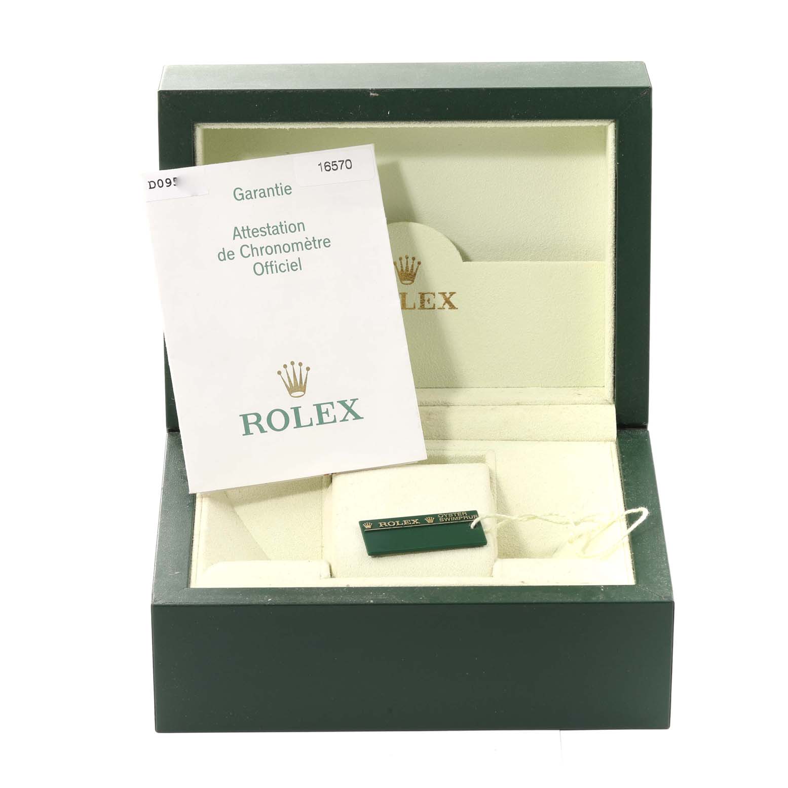 This image shows an open Rolex Explorer 16570 Men
s Stainless Steel Black Dial 16570 Men
s Stainless Steel Black Dial watch box, including the warranty card and tags, viewed from a front angle.