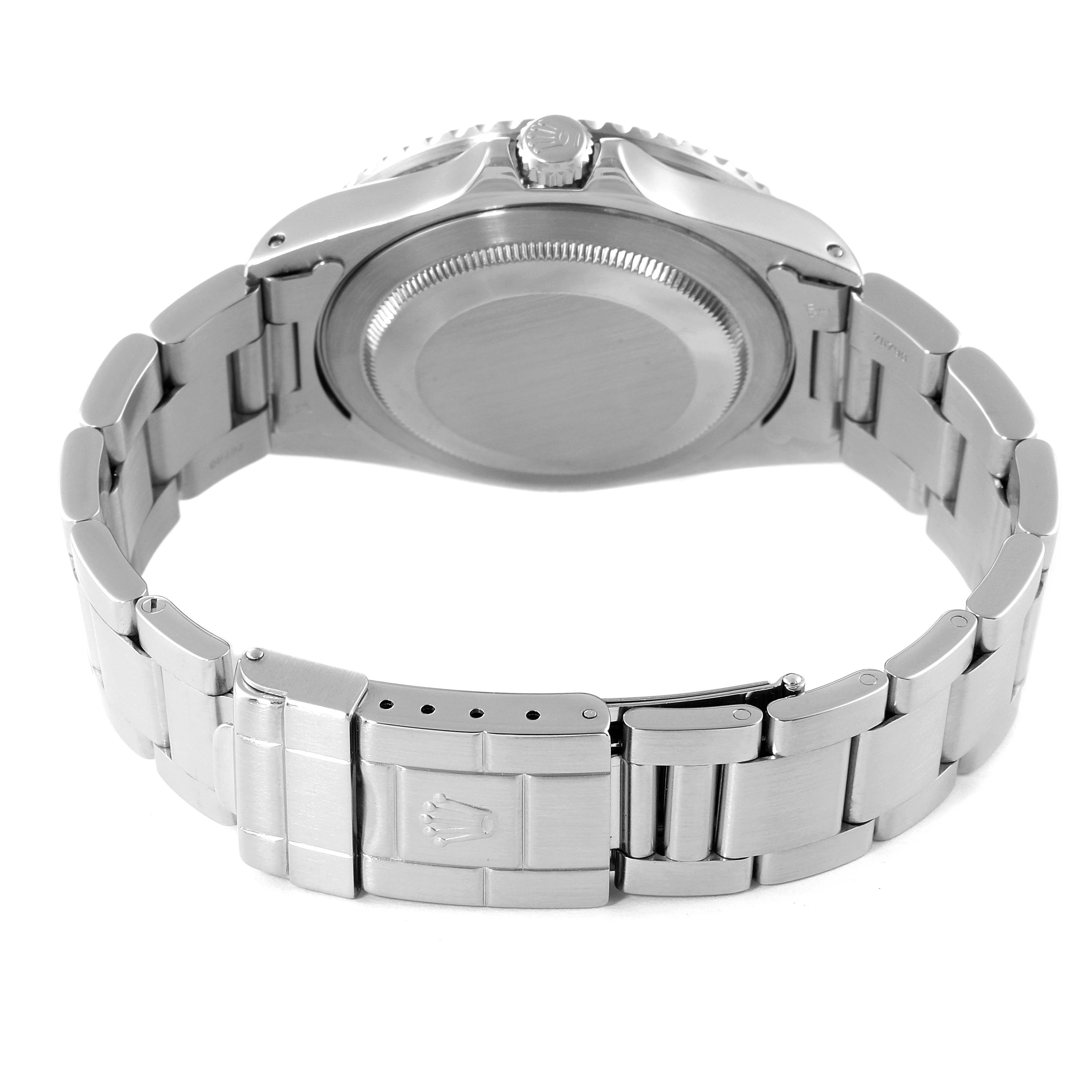 The image shows the back view of a Rolex GMT-Master 16700 Men
s Stainless Steel Black Dial 16700 Men
s Stainless Steel Black Dial watch, highlighting its closed clasp and stainless steel bracelet.