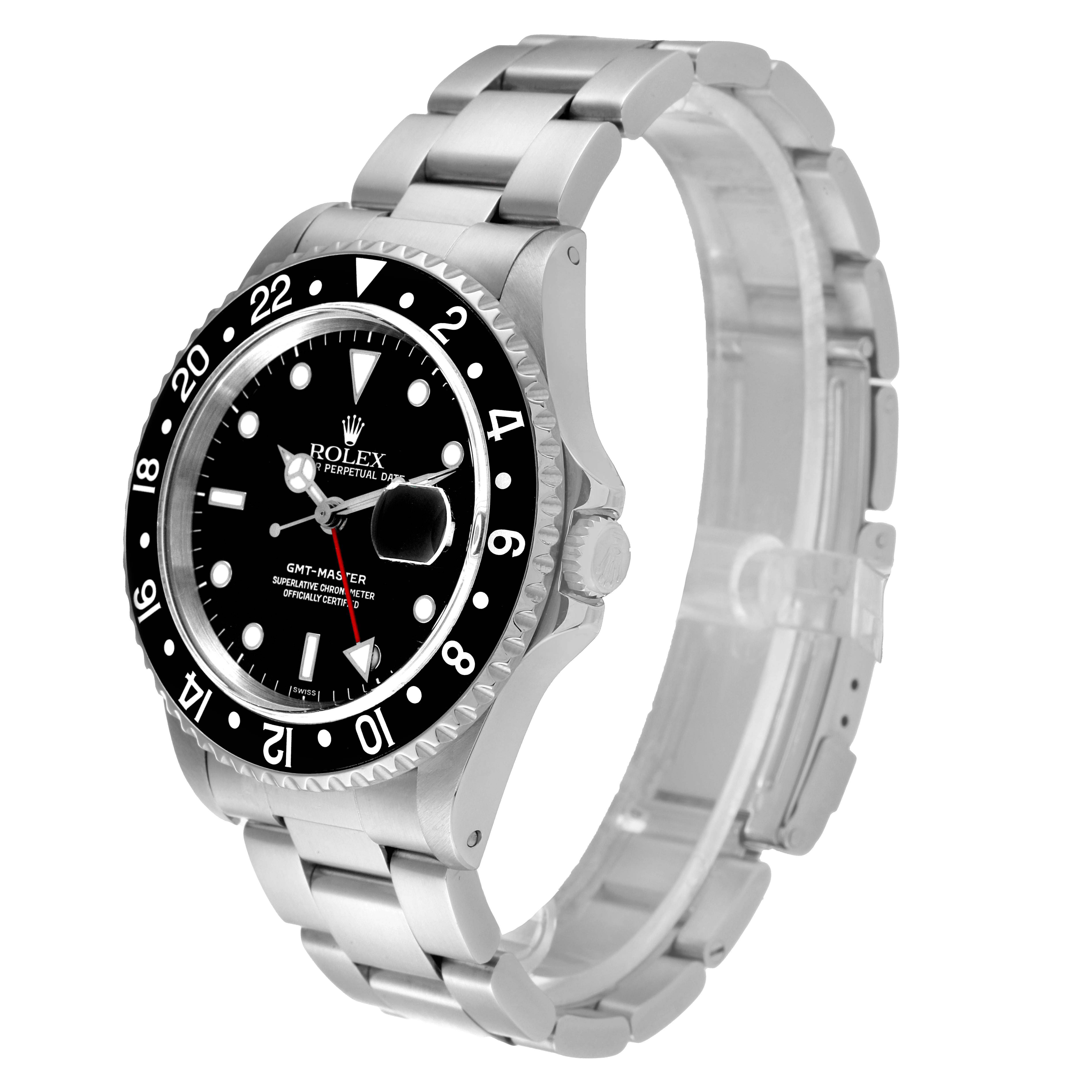 The Rolex GMT-Master 16700 Men
s Stainless Steel Black Dial 16700 Men
s Stainless Steel Black Dial watch is shown at a three-quarter angle, displaying the face, bezel, case, bracelet, and clasp.