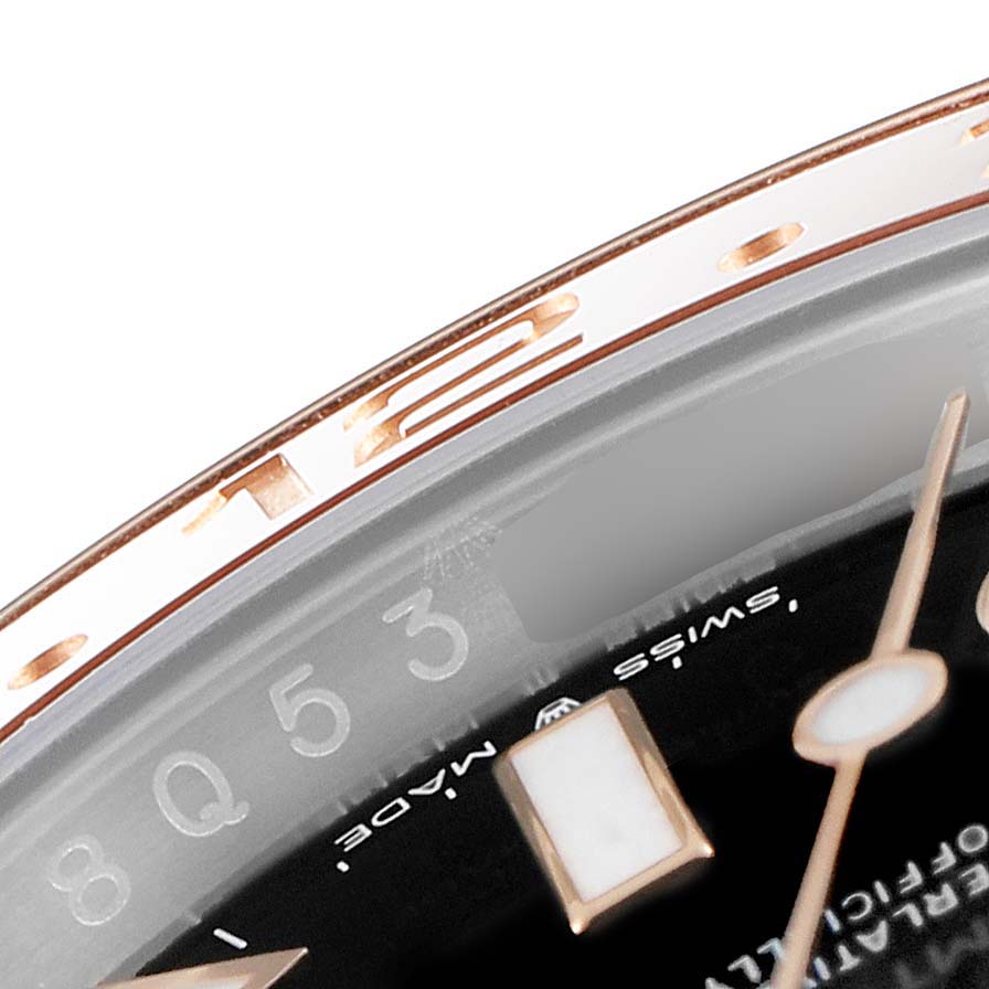 This close-up image of the Rolex GMT-Master 126711 Men
s Stainless Steel Black Dial 126711 Men
s Stainless Steel Black Dial watch shows parts of the bezel, dial, and hour markers.