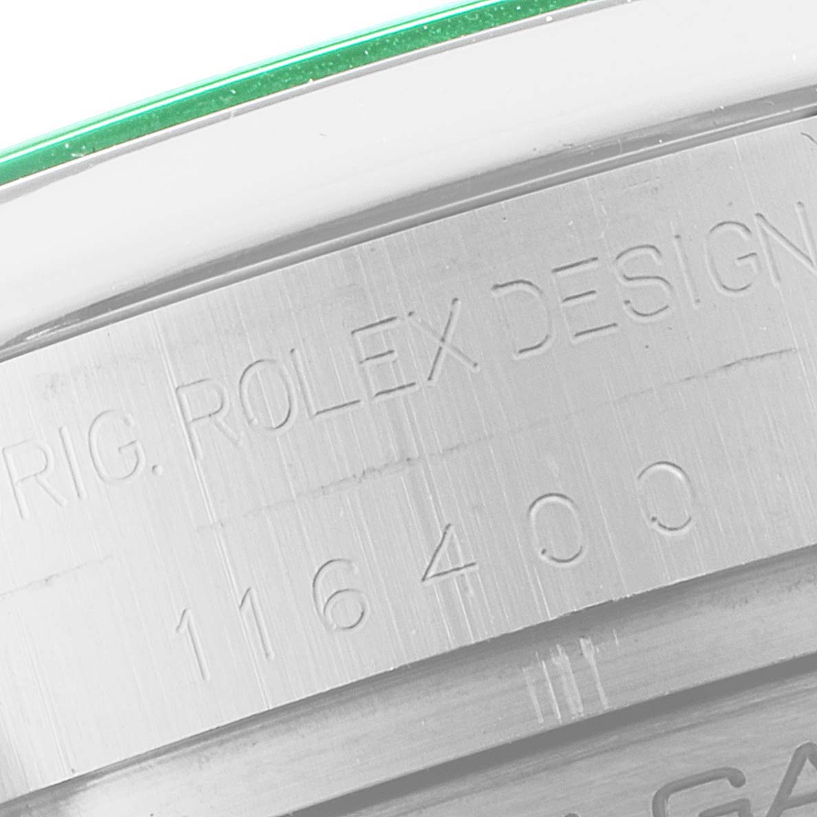 Close-up of a side view of the Rolex Milgauss 116400GV Men
s Stainless Steel Blue Dial 116400GV Men
s Stainless Steel Blue Dial watch focusing on the engraved model number and brand detailing.