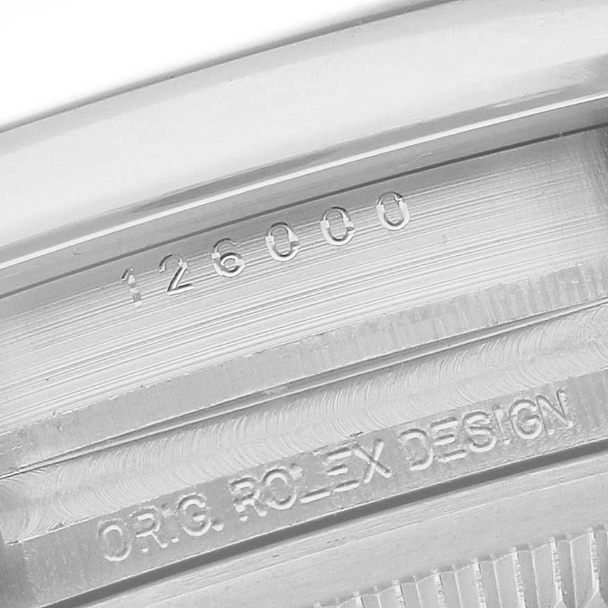 The image shows the case back edge of the Rolex Oyster Perpetual 126000 Men's Stainless Steel Silver Dial, highlighting the model number and "ORIG. ROLEX DESIGN" engraving.