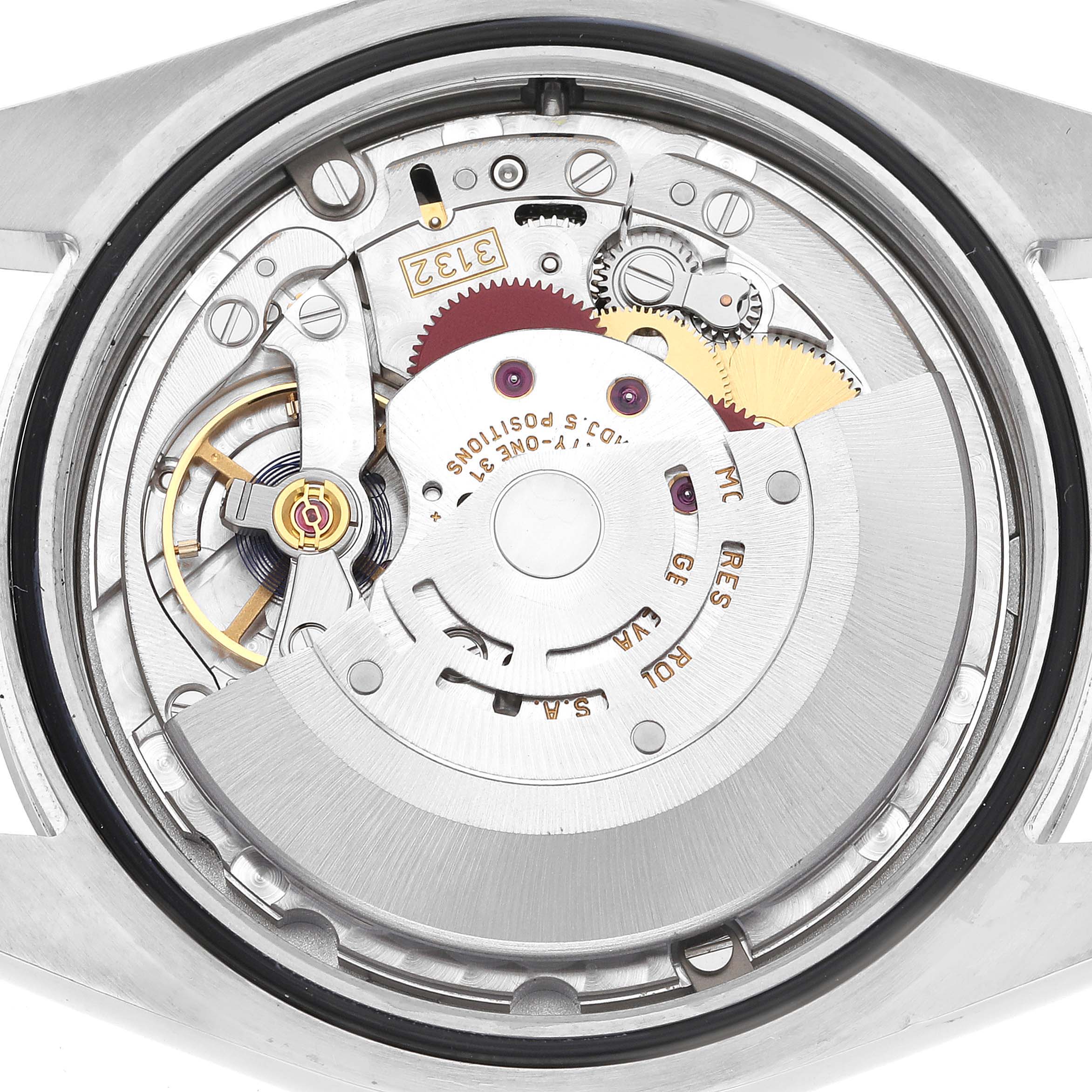 The image shows the internal mechanism and movement of a Rolex Oyster Perpetual 114300 Men's Stainless Steel Grey Dial 114300 Men's Stainless Steel Grey Dial watch, viewed from the back.