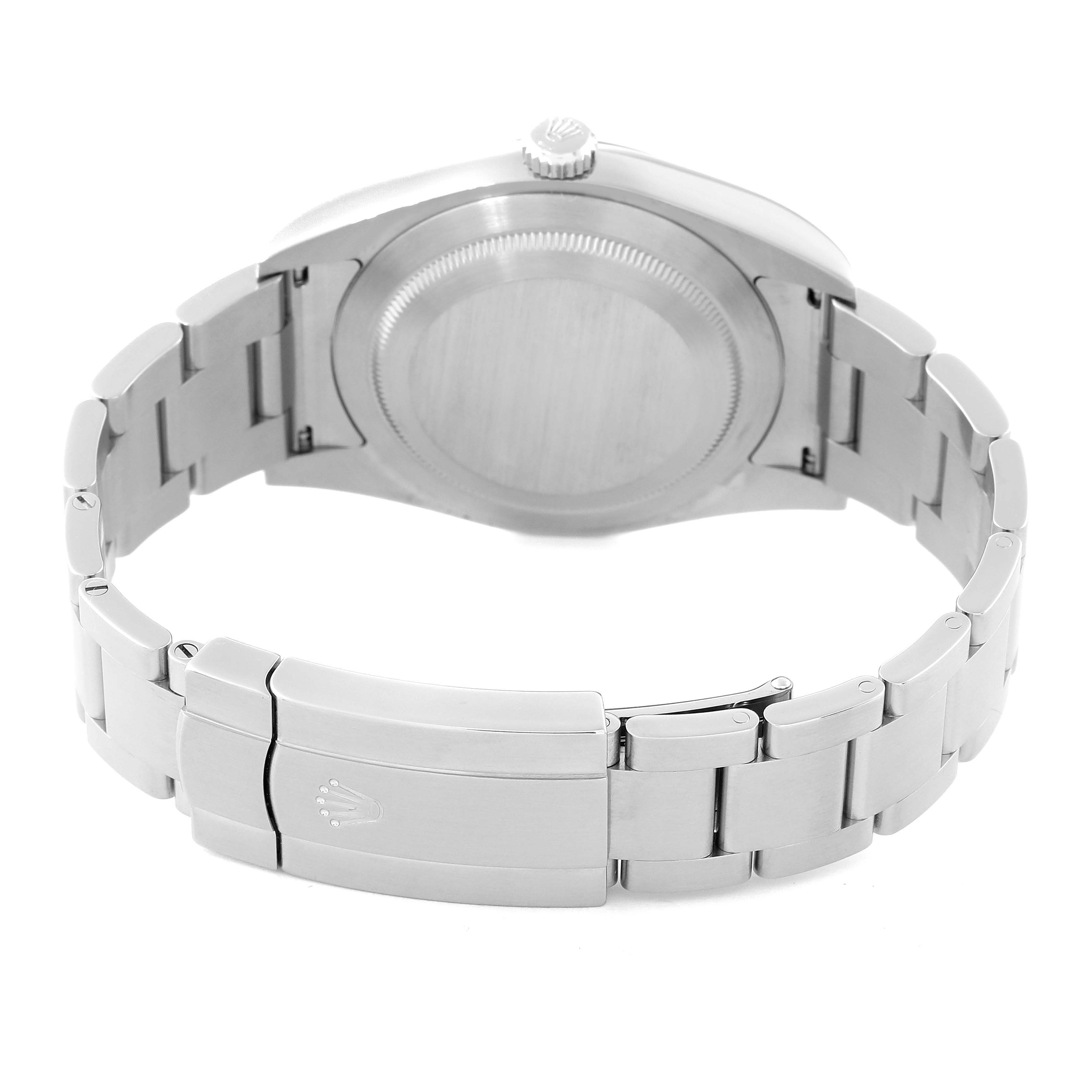 The image shows the back case, crown, and bracelet clasp of a Rolex Oyster Perpetual 114300 Men's Stainless Steel Grey Dial 114300 Men's Stainless Steel Grey Dial watch from a rear angle.