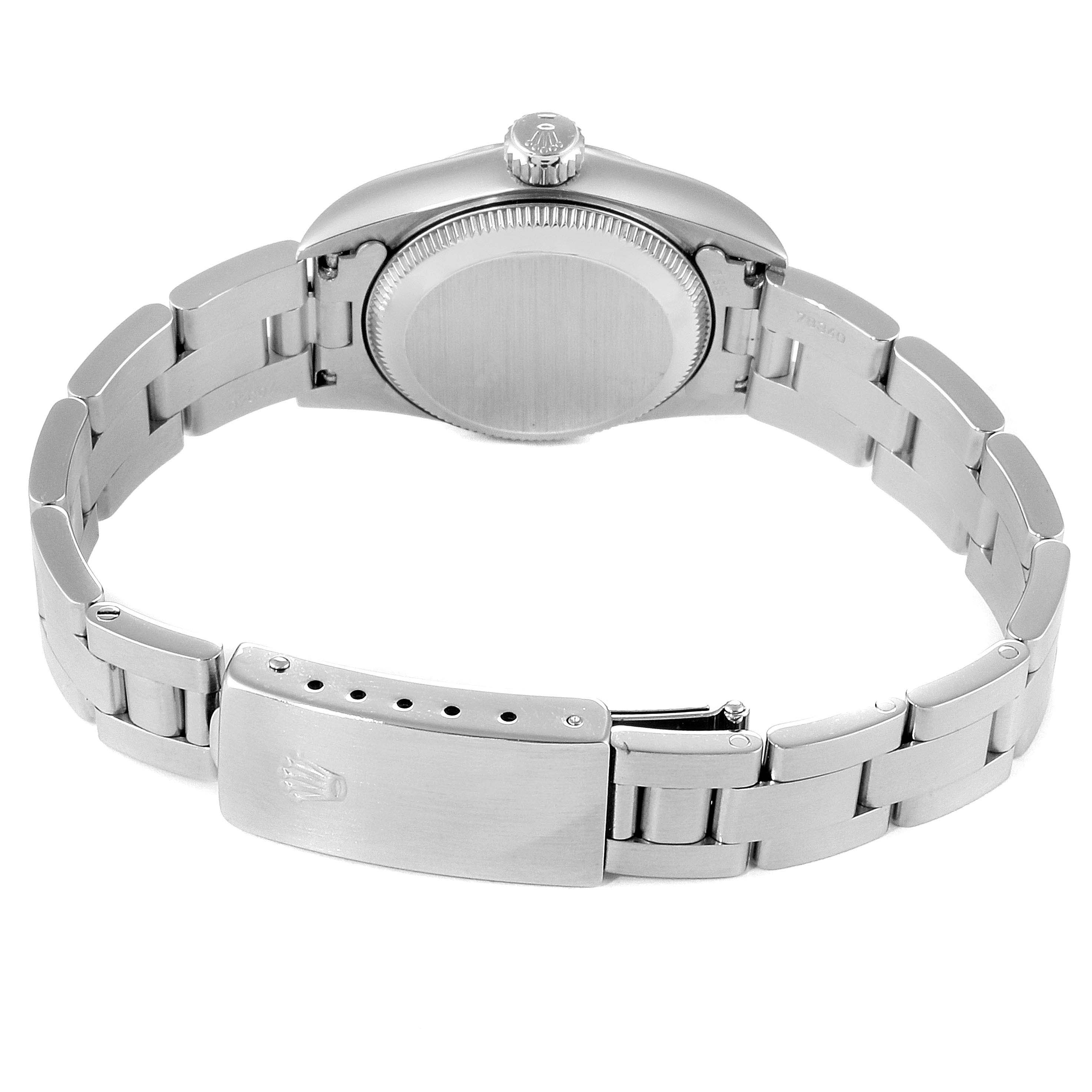 The image shows the back view of a Rolex Oyster Perpetual 67180 Women
s Stainless Steel Black Dial 67180 Women
s Stainless Steel Black Dial watch, highlighting its bracelet and clasp.