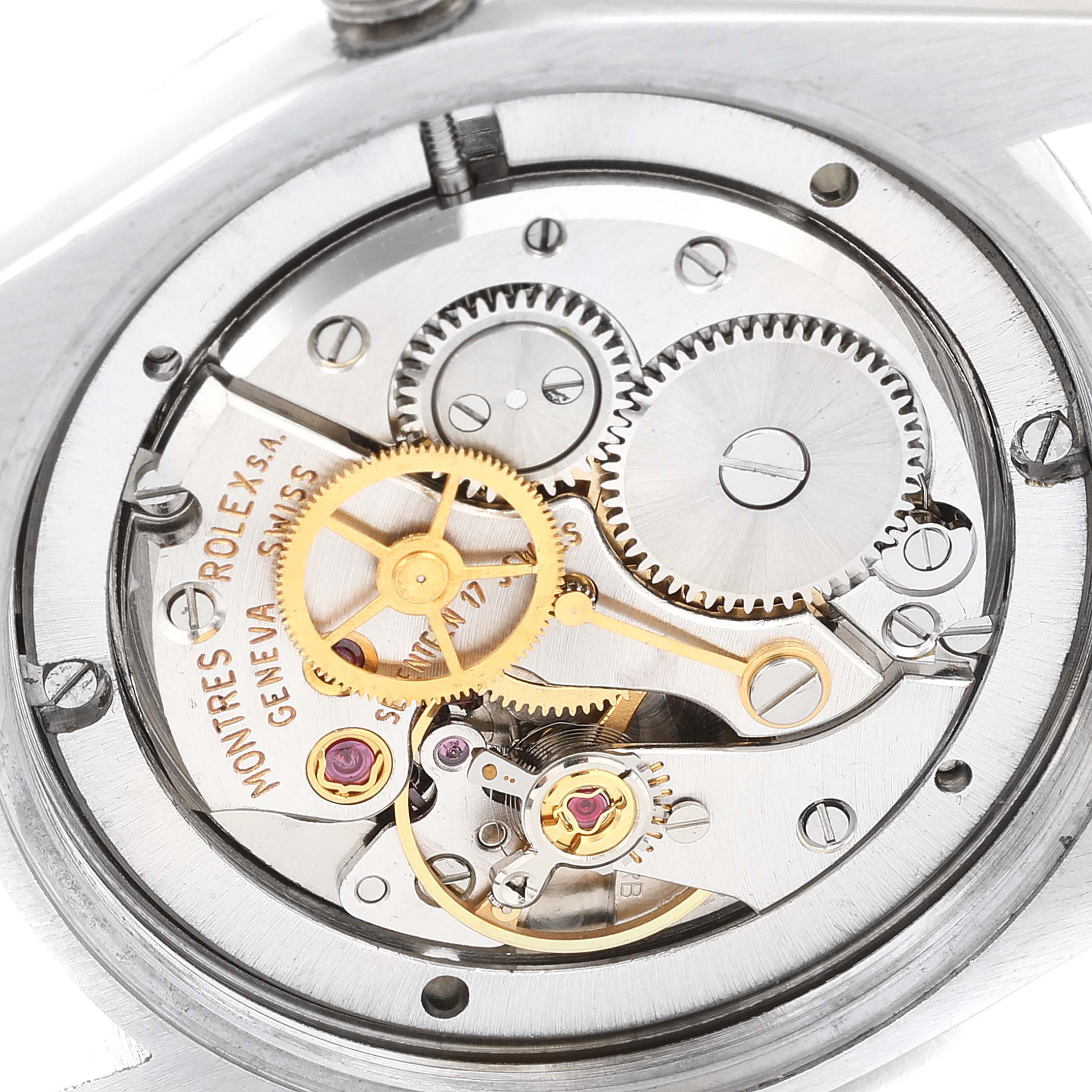 This image shows the detailed inner mechanism and gears of a Rolex Date 6694 Men's Stainless Steel Silver Dial 6694 Men's Stainless Steel Silver Dial model watch from a close-up angle.