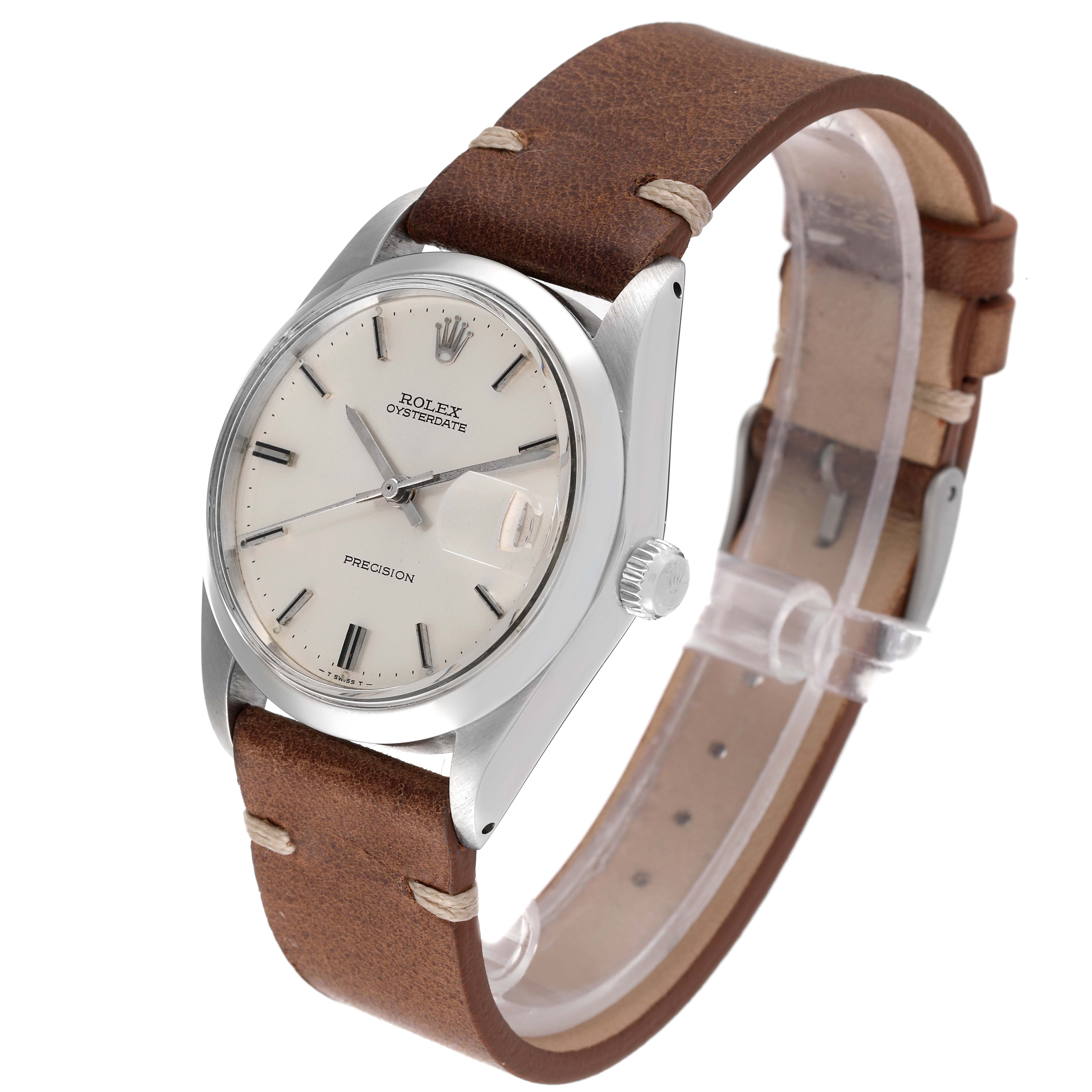 The Rolex Date 6694 Men's Stainless Steel Silver Dial 6694 Men's Stainless Steel Silver Dial model watch is shown from a three-quarter angle displaying the dial, case, crown, and brown leather strap.
