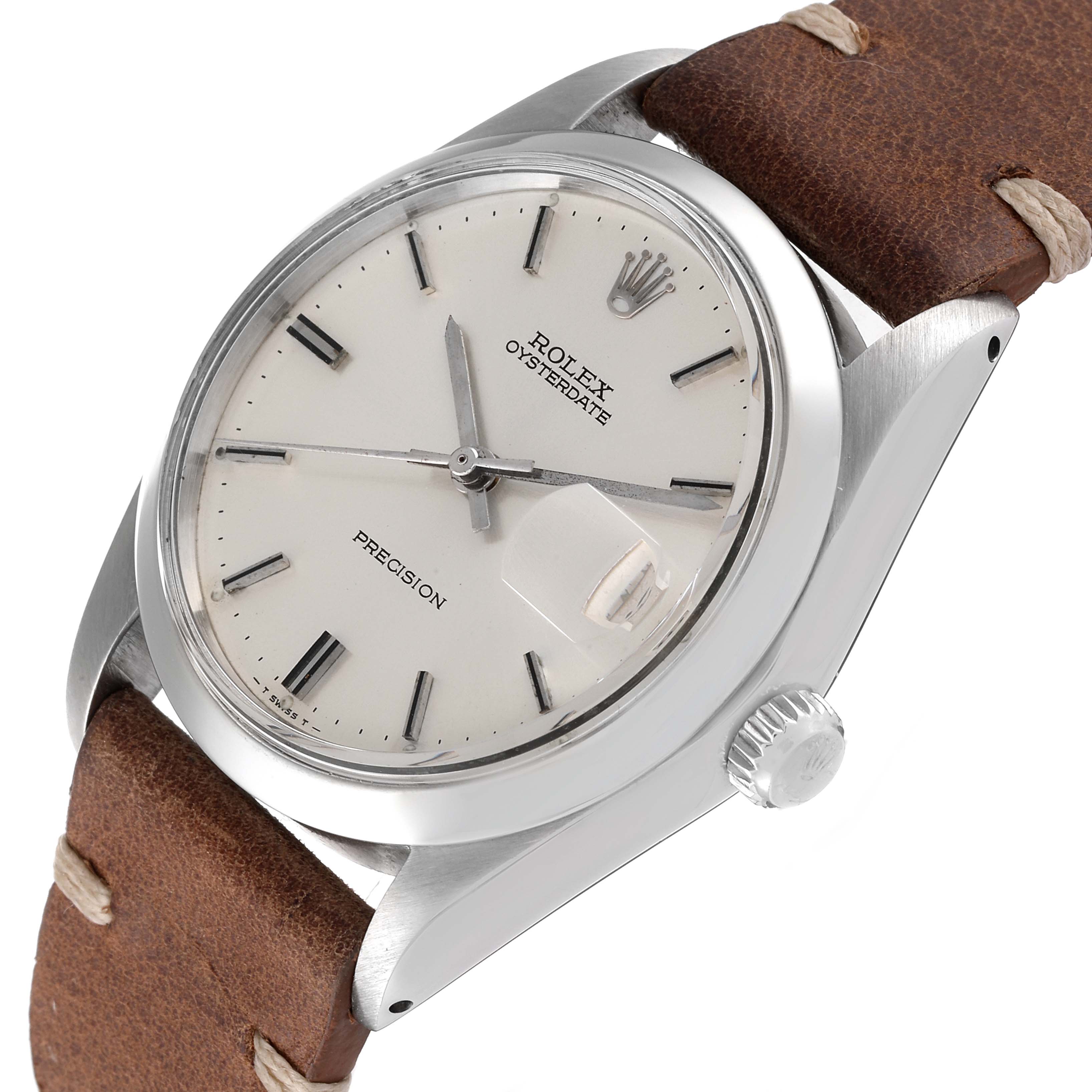The Rolex Date 6694 Men's Stainless Steel Silver Dial 6694 Men's Stainless Steel Silver Dial model watch is shown at a three-quarter angle, highlighting the dial, crown, and brown leather strap.